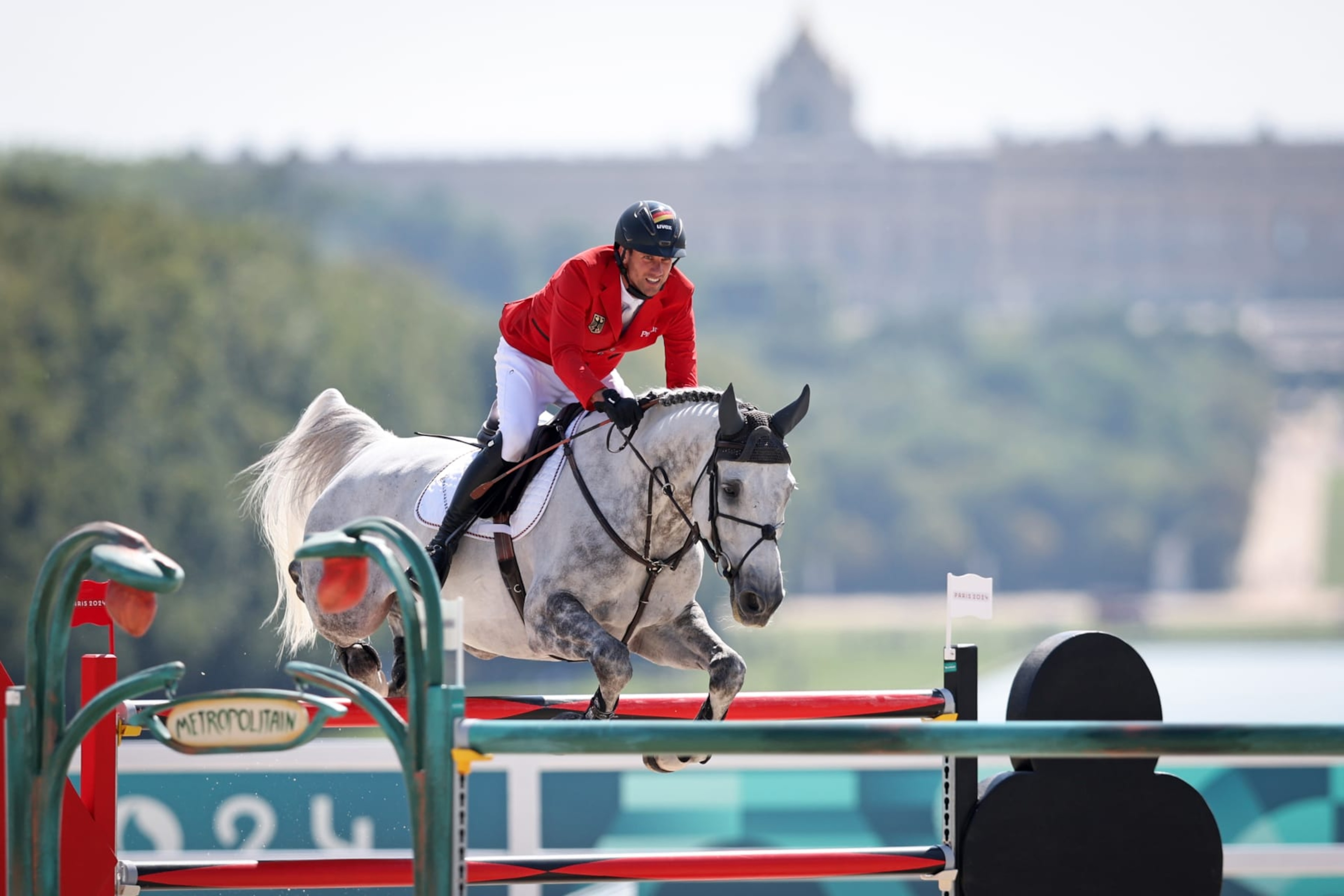 VERSAILLES, FRANCE - AUGUST 06: Christian Kukuk and horse Checker 47 of Team Germany compete in the Jumping Individual Final on day eleven of the Olympic Games Paris 2024 at Chateau de Versailles on August 06, 2024 in Versailles, France. (Photo by Stefan Matzke - sampics/Getty Images) VERSAILLES, FRANCE - AUGUST 06: Christian Kukuk and horse Checker 47 of Team Germany compete in the Jumping Individual Final on day eleven of the Olympic Games Paris 2024 at Chateau de Versailles on August 06, 2024 in Versailles, France. (Photo by Stefan Matzke - sampics/Getty Images)