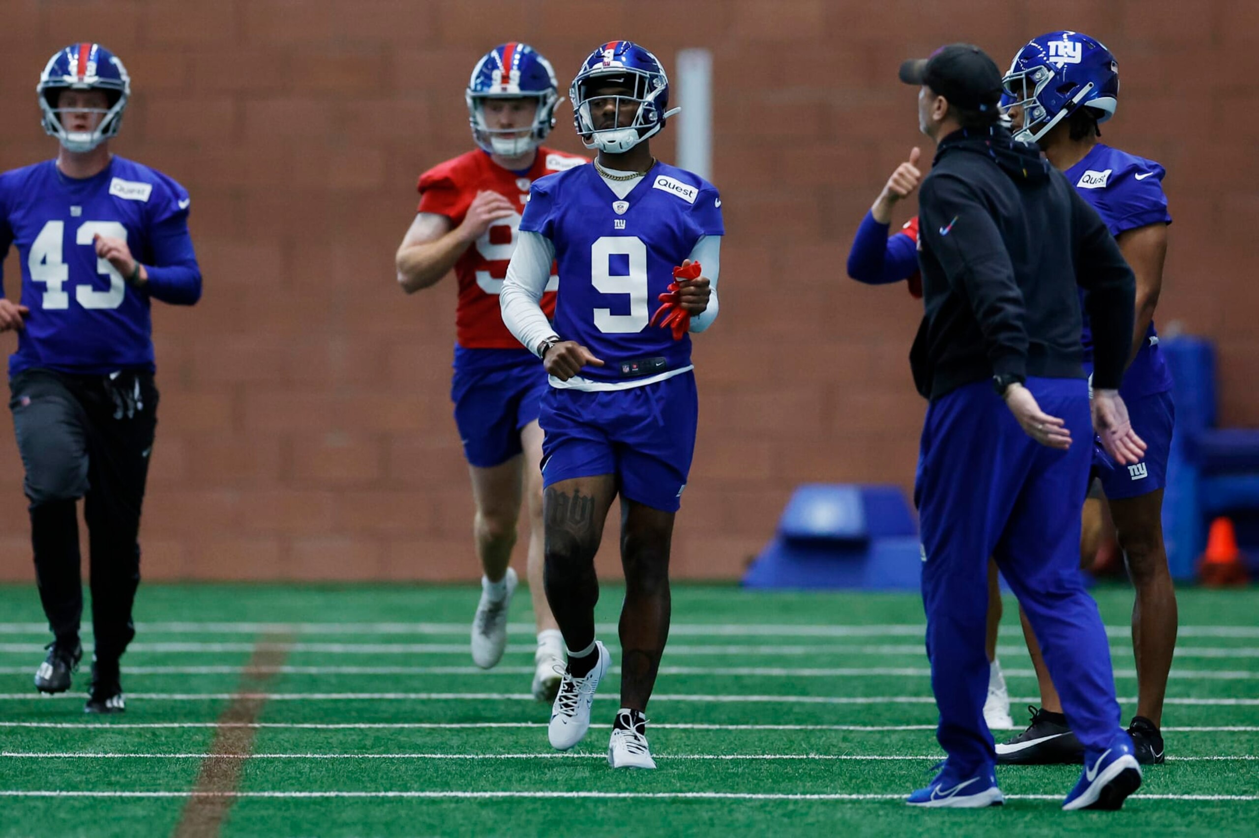 EAST RUTHERFORD, NEW JERSEY - MAY 10: Wide receiver Malik Nabers #9 of the New York Yankees runs drills during New York Giants Rookie Minicamp at Quest Diagnostics Training Center on May 10, 2024 in East Rutherford, New Jersey. (Photo by Sarah Stier/Getty Images) EAST RUTHERFORD, NEW JERSEY - MAY 10: Wide receiver Malik Nabers #9 of the New York Yankees runs drills during New York Giants Rookie Minicamp at Quest Diagnostics Training Center on May 10, 2024 in East Rutherford, New Jersey. (Photo by Sarah Stier/Getty Images)