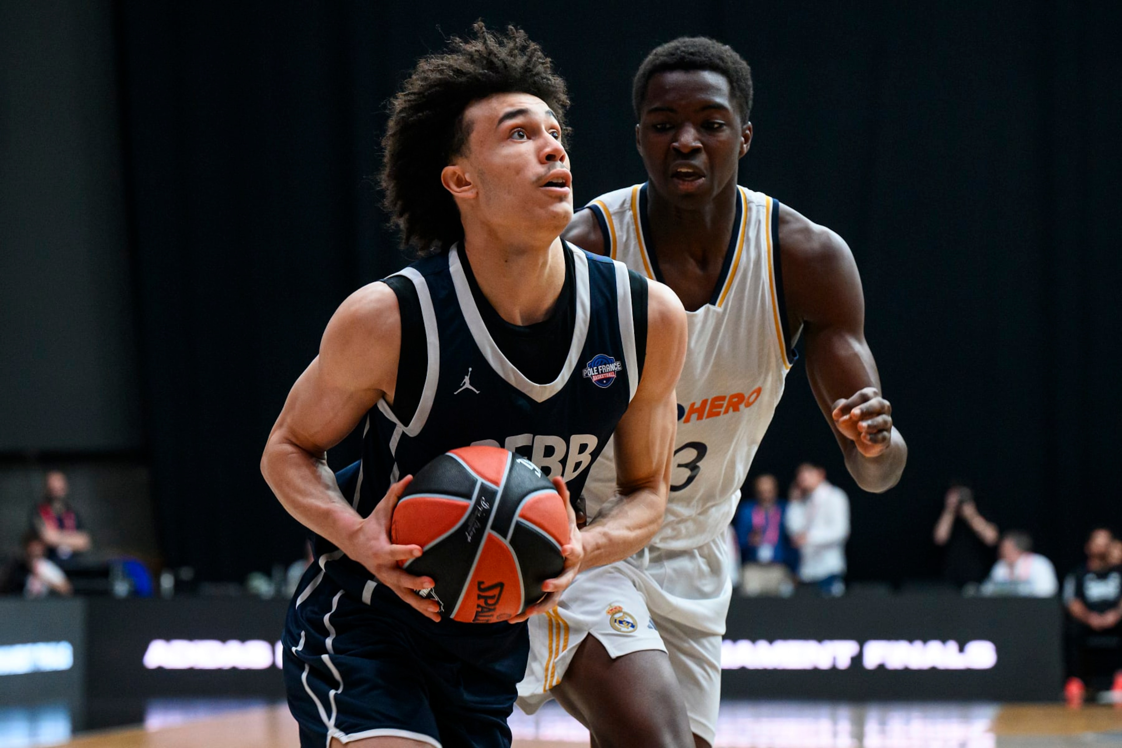 BERLIN, GERMANY - MAY 26: Nolan Traore, #0 of U18 PFBB INSEP Paris in action during U18 Real Madrid vs U18 PFBB Insep Paris during the EB Adidas Next Generation Tournament Championship Game at Uber Eats Music Hall on May 26, 2024 in Berlin, Germany. (Photo by David Grau/Euroleague Basketball via Getty Images) BERLIN, GERMANY - MAY 26: Nolan Traore, #0 of U18 PFBB INSEP Paris in action during U18 Real Madrid vs U18 PFBB Insep Paris during the EB Adidas Next Generation Tournament Championship Game at Uber Eats Music Hall on May 26, 2024 in Berlin, Germany. (Photo by David Grau/Euroleague Basketball via Getty Images)