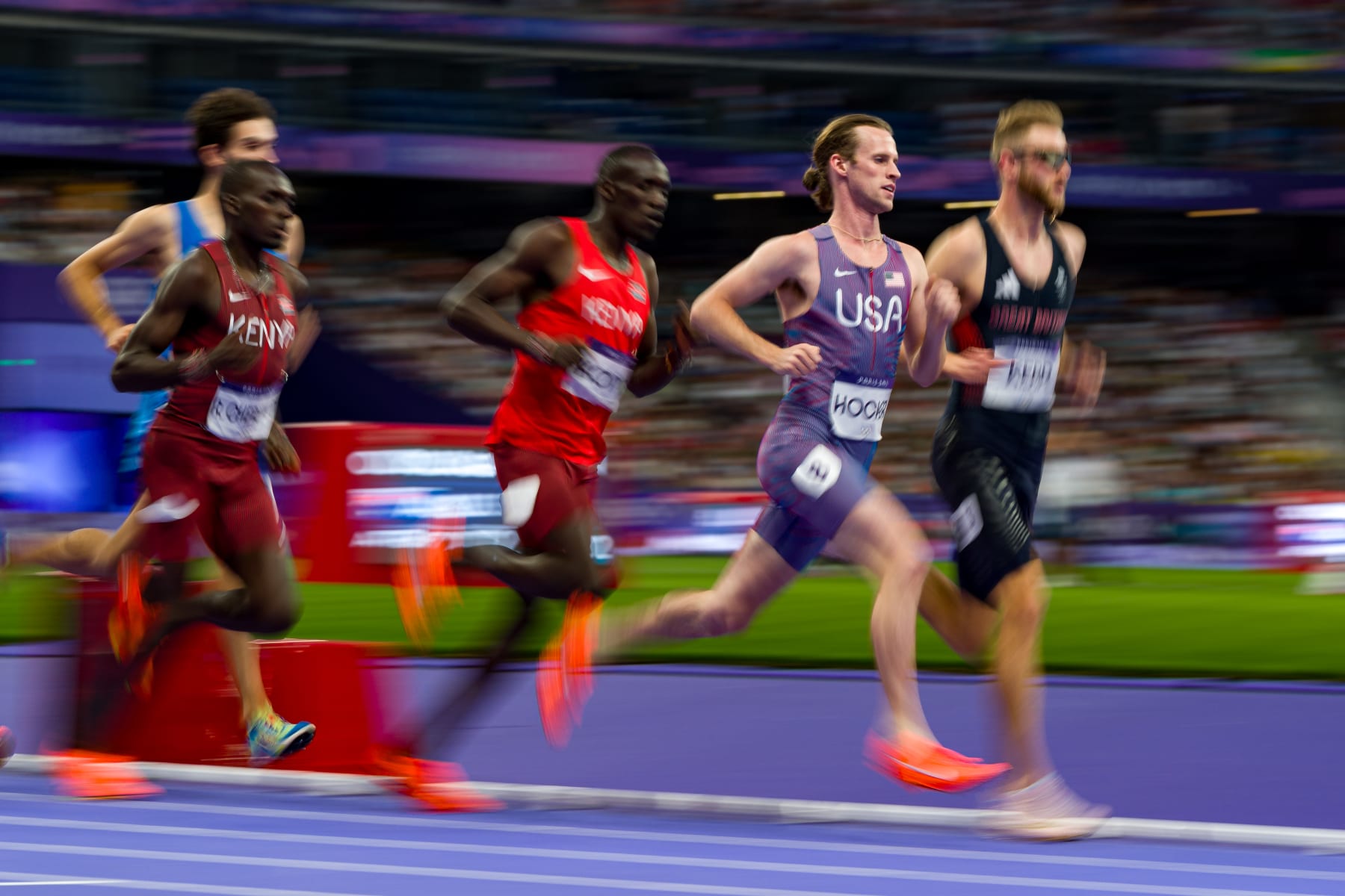 PARIS, FRANCE - AUGUST 04: Cole Hocker (2nd R) of Team United States and Josh Kerr (R) of Team Great Britain during Men's 1500m Semi-Final on day nine of the Olympic Games Paris 2024 at Stade de France on August 04, 2024 in Paris, France. (Photo by Andy Cheung/Getty Images)