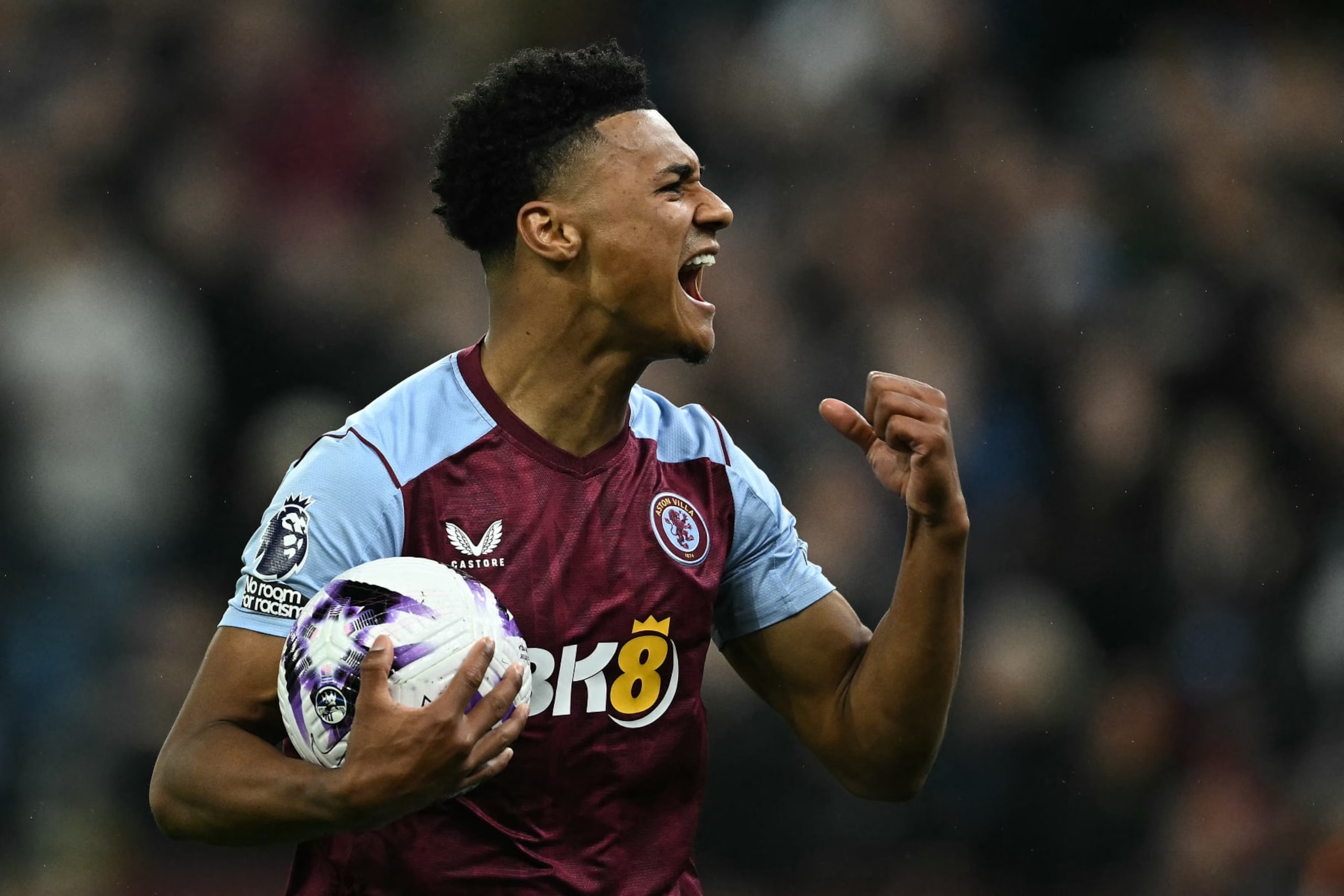 Aston Villa's English striker #11 Ollie Watkins celebrates scoring the team's second goal during the English Premier League football match between Aston Villa and Liverpool at Villa Park in Birmingham, central England on May 13, 2024. (Photo by Ben Stansall / AFP) / RESTRICTED TO EDITORIAL USE. No use with unauthorized audio, video, data, fixture lists, club/league logos or 'live' services. Online in-match use limited to 120 images. An additional 40 images may be used in extra time. No video emulation. Social media in-match use limited to 120 images. An additional 40 images may be used in extra time. No use in betting publications, games or single club/league/player publications. /  (Photo by BEN STANSALL/AFP via Getty Images)