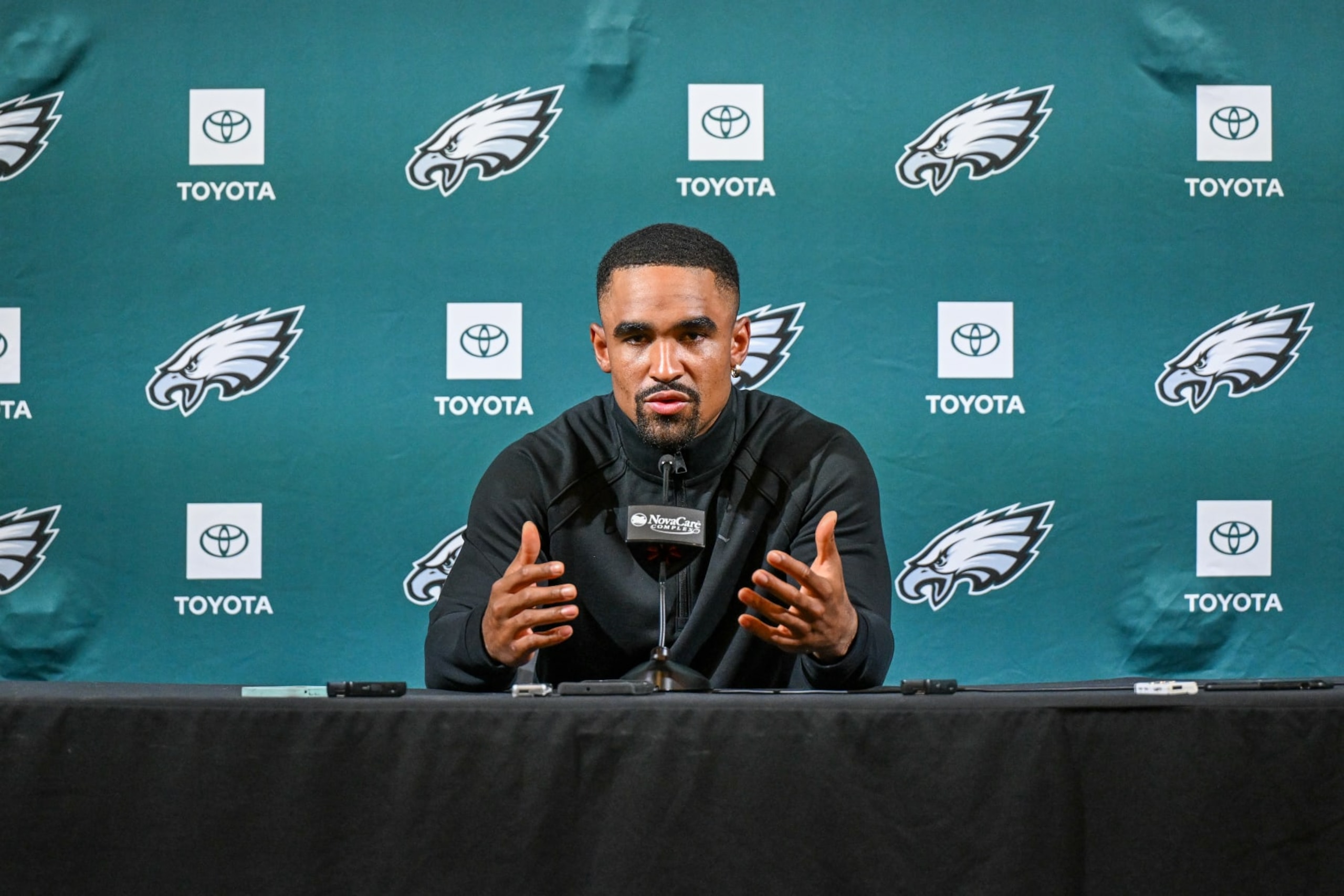 PHILADELPHIA, PA - JUNE 06: Philadelphia Eagles quarterback Jalen Hurts (1) answering a question at the press conference during Eagles training camp on June 6th, 2024 at the NovaCare Complex in Philadelphia, Pa. (Photo by Terence Lewis/Icon Sportswire via Getty Images)
