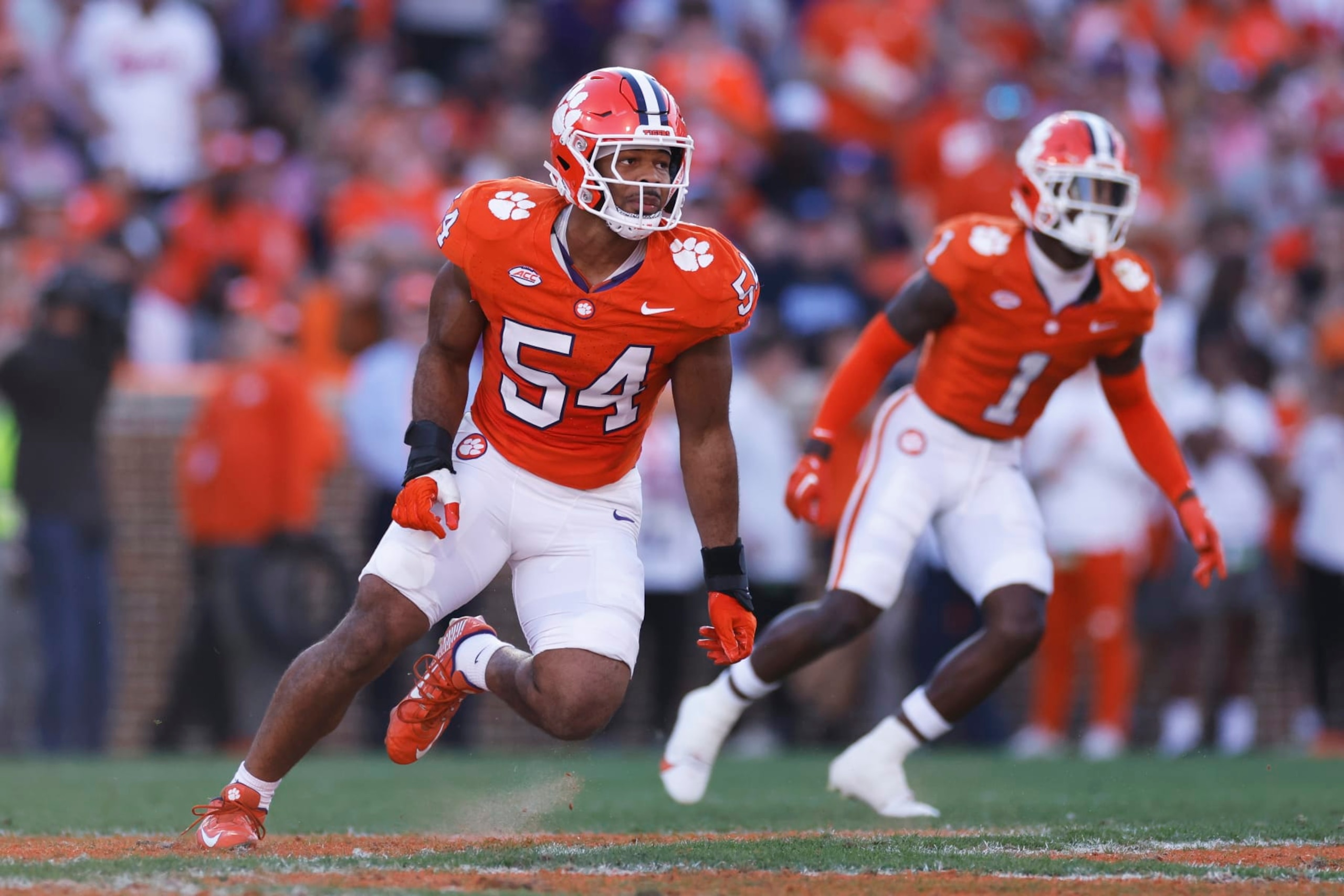 CLEMSON, SC - NOVEMBER 18: Clemson Tigers linebacker Jeremiah Trotter Jr. (54) pursues a play on defense during a college football game against the North Carolina Tar Heels on November 18, 2023 at Memorial Stadium in Clemson, South Carolina. (Photo by Joe Robbins/Icon Sportswire via Getty Images) CLEMSON, SC - NOVEMBER 18: Clemson Tigers linebacker Jeremiah Trotter Jr. (54) pursues a play on defense during a college football game against the North Carolina Tar Heels on November 18, 2023 at Memorial Stadium in Clemson, South Carolina. (Photo by Joe Robbins/Icon Sportswire via Getty Images)