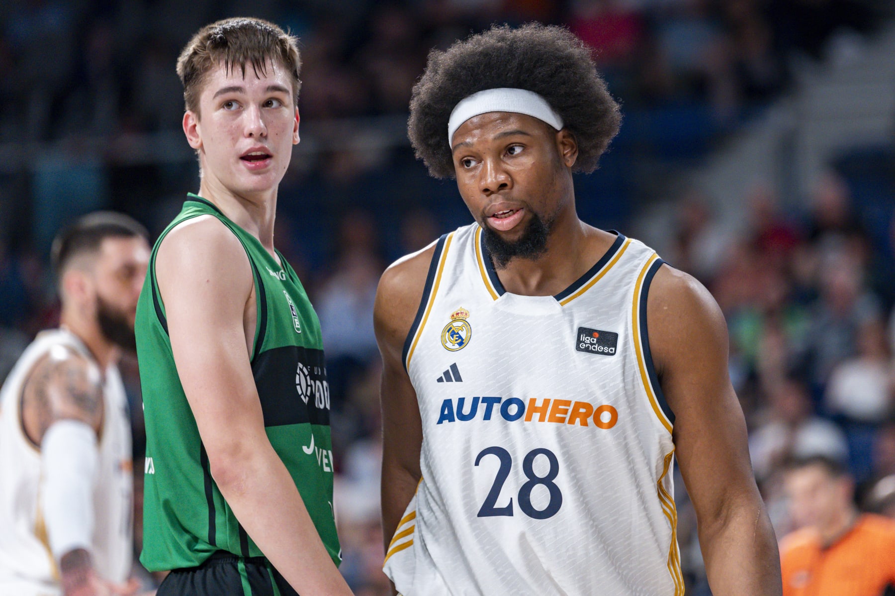 MADRID, SPAIN - APRIL 14: Michael Ruzic of Joventut Badalona (L) and Guerschon Yabusele of Real Madrid (R) seen during ACB Liga Endesa Basketball match between Real Madrid and Joventut Badalona at WiZink Center on April 14, 2024 in Madrid, Spain. (Photo by Alberto Gardin/Eurasia Sport Images/Getty Images)