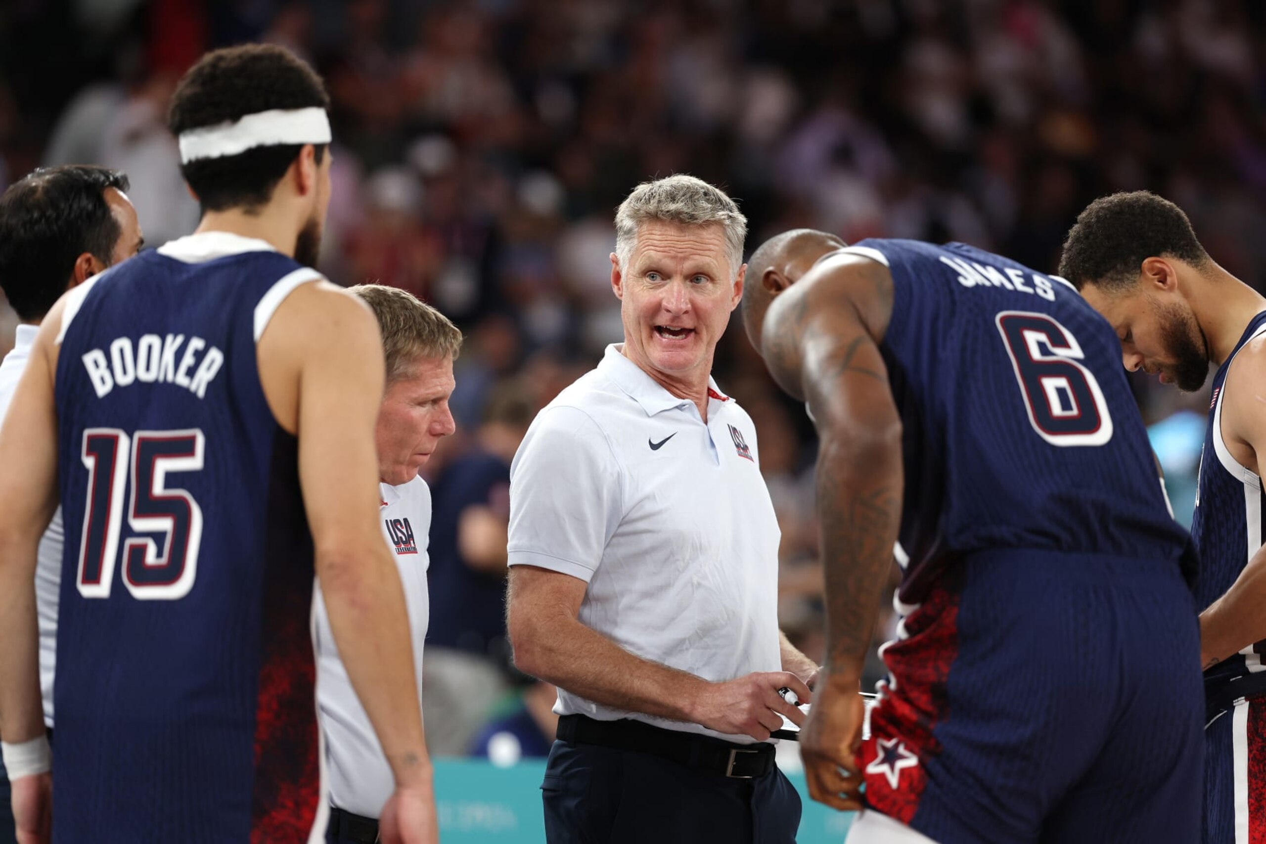 PARIS, FRANCE - AUGUST 06: Head coach Steve Kerr of Team United States talks to his team during a Men's basketball quarterfinal game between Team United States and Team Brazil on day eleven of the Olympic Games Paris 2024 at Bercy Arena on August 06, 2024 in Paris, France. (Photo by Jamie Squire/Getty Images) PARIS, FRANCE - AUGUST 06: Head coach Steve Kerr of Team United States talks to his team during a Men's basketball quarterfinal game between Team United States and Team Brazil on day eleven of the Olympic Games Paris 2024 at Bercy Arena on August 06, 2024 in Paris, France. (Photo by Jamie Squire/Getty Images)