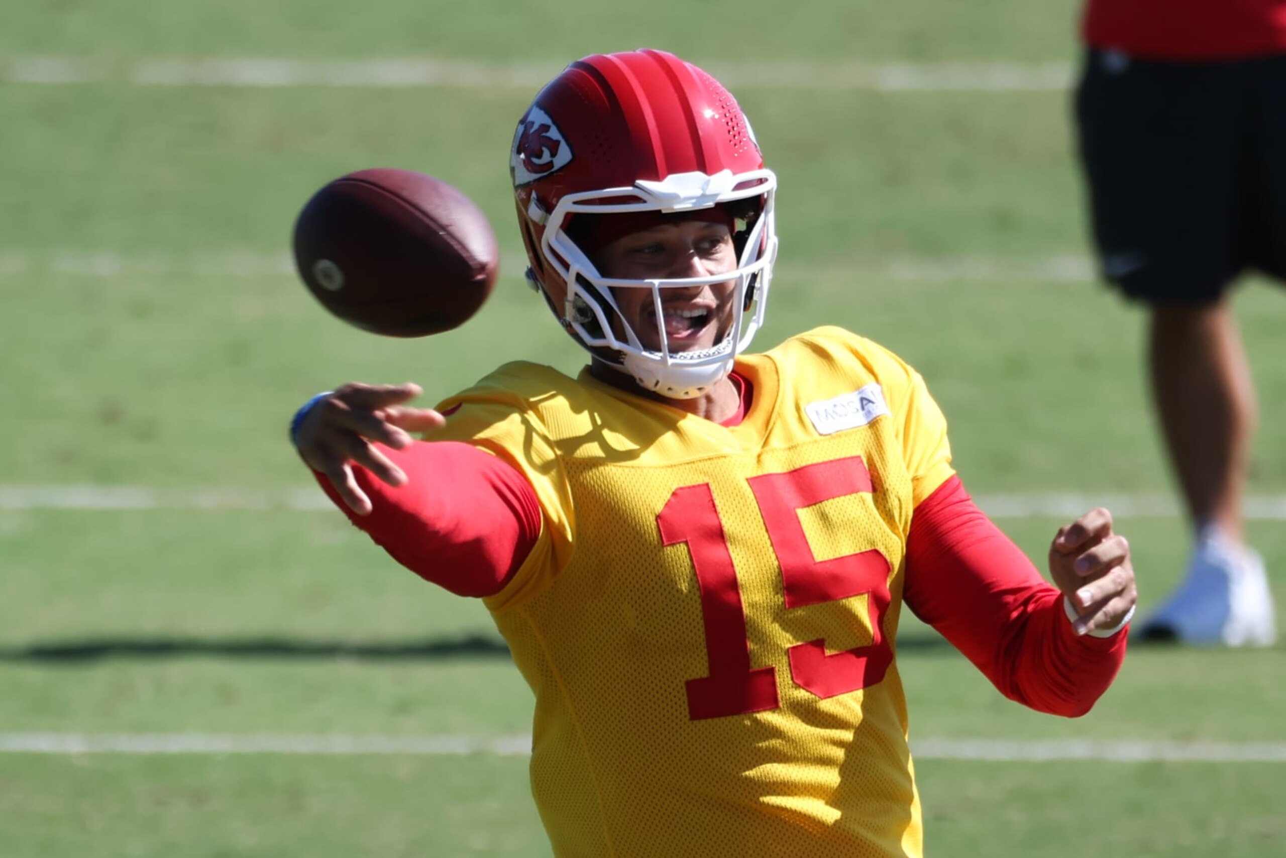 ST. JOSEPH, MO - AUGUST 02: Kansas City Chiefs quarterback Patrick Mahomes (15) throws a pass across her body during training camp on August 2, 2024 at Missouri Western State University in St. Joseph, MO. (Photo by Scott Winters/Icon Sportswire via Getty Images)