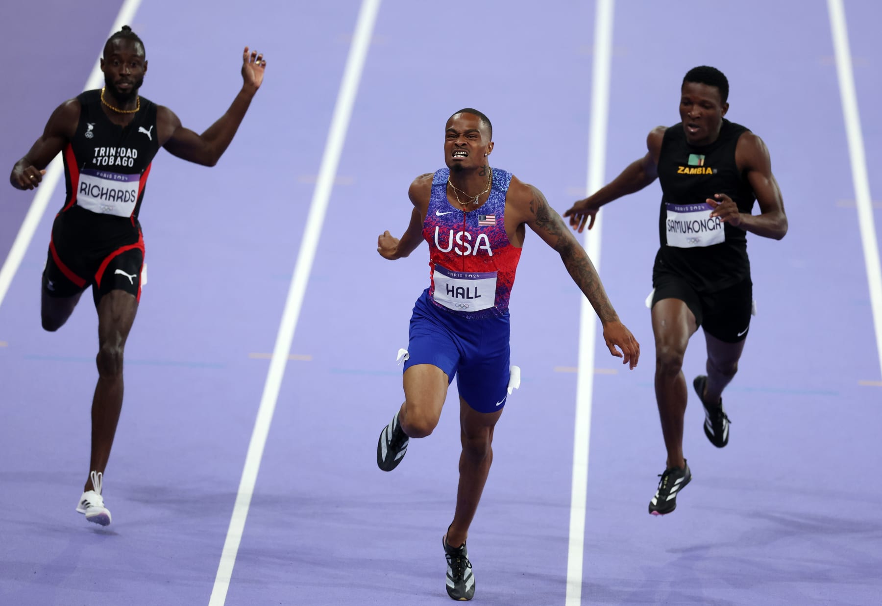 PARIS, FRANCE - AUGUST 07: (EDITORS NOTE: Image was captured using a remote camera) Quincy Hall of Team United States celebrates after winning the gold medal during the Men's 400m Final on day twelve of the Olympic Games Paris 2024 at Stade de France on August 07, 2024 in Paris, France. (Photo by Al Bello/Getty Images)
