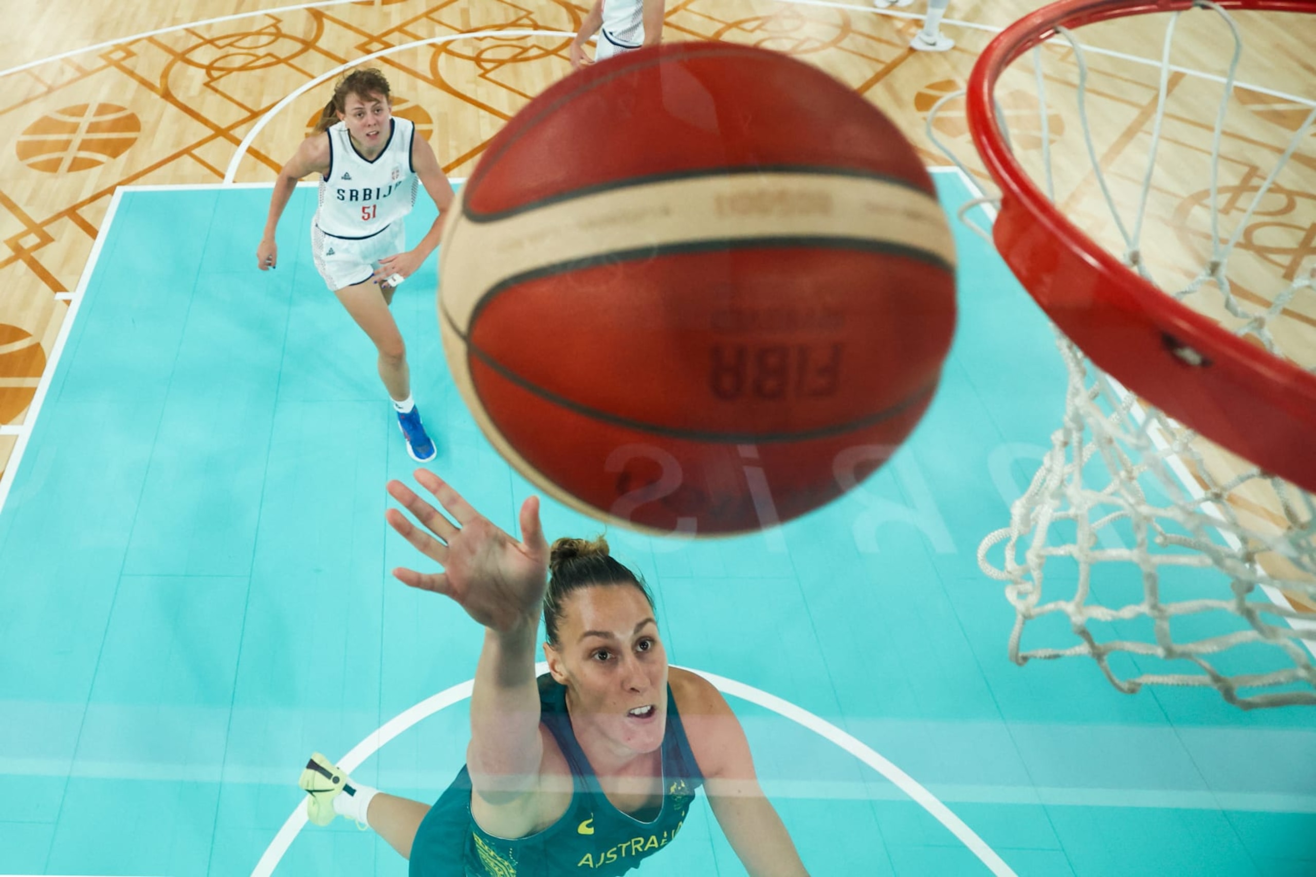 Australia's #06 Steph Talbot goes to the basket in the women's quarterfinal basketball match between Serbia and Australia during the Paris 2024 Olympic Games at the Bercy  Arena in Paris on August 7, 2024. (Photo by Gregory SHAMUS / POOL / AFP) (Photo by GREGORY SHAMUS/POOL/AFP via Getty Images)