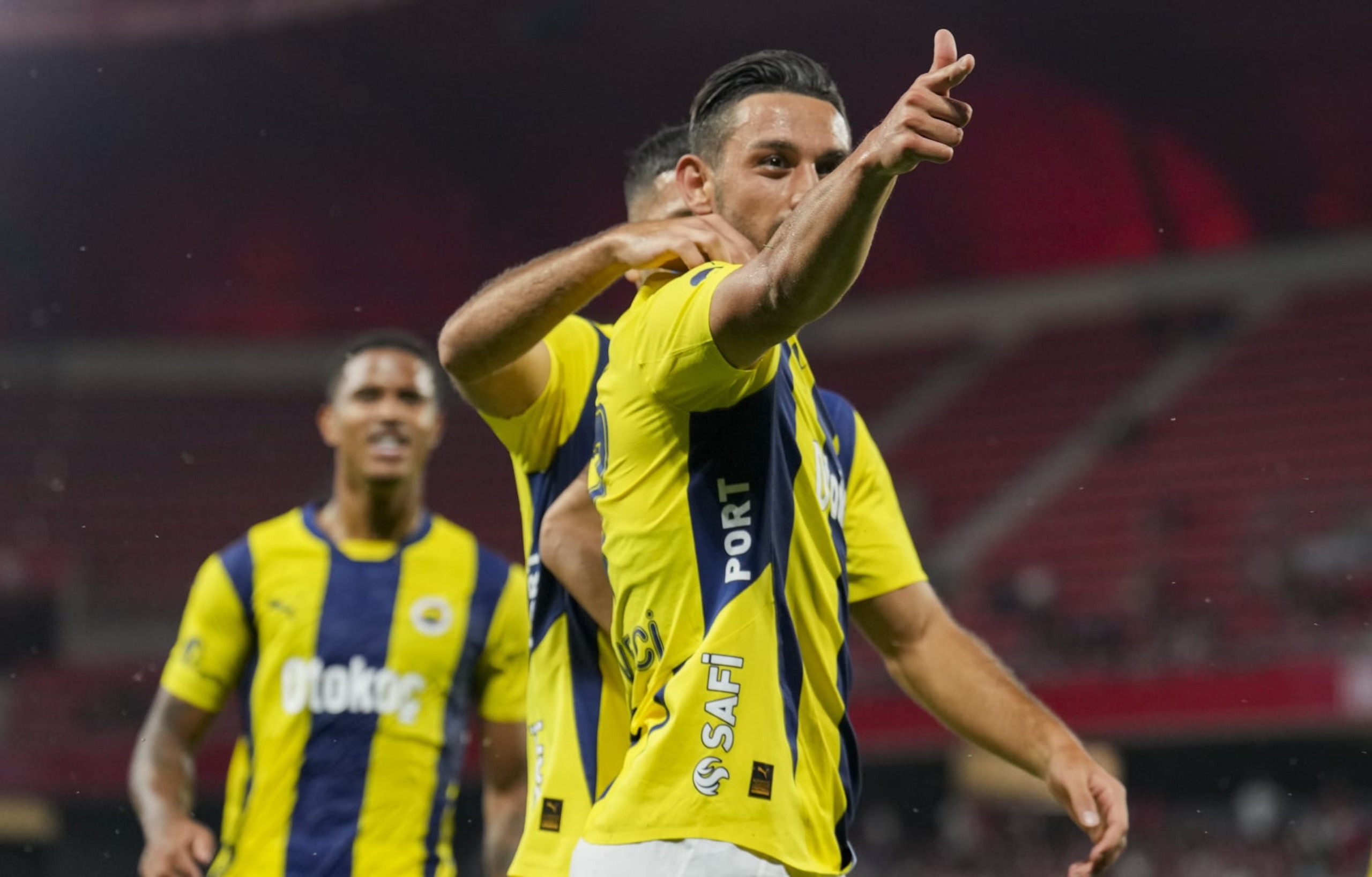 VALENCIENNES, FRANCE - AUGUST 6: Irfan Can Kahveci of Fenerbahce celebrates after his score with the famous shooting pose of Turkish Olympic silver medalist shooter Yusuf Dikec during UEFA Champions League 3rd qualifying match between Lille and Fenerbahce at Hainaut Stadium in Valenciennes, France on August 6, 2024. (Photo by Mustafa Ciftci/Anadolu via Getty Images)