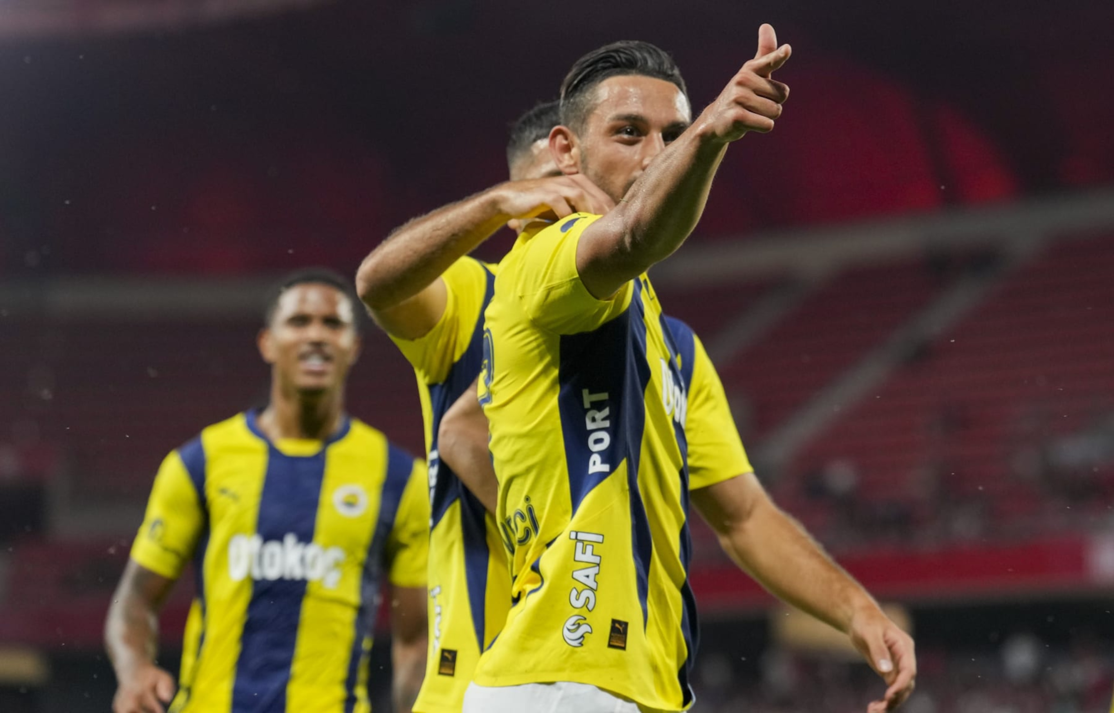 VALENCIENNES, FRANCE - AUGUST 6: Irfan Can Kahveci of Fenerbahce celebrates after his score with the famous shooting pose of Turkish Olympic silver medalist shooter Yusuf Dikec during UEFA Champions League 3rd qualifying match between Lille and Fenerbahce at Hainaut Stadium in Valenciennes, France on August 6, 2024. (Photo by Mustafa Ciftci/Anadolu via Getty Images)