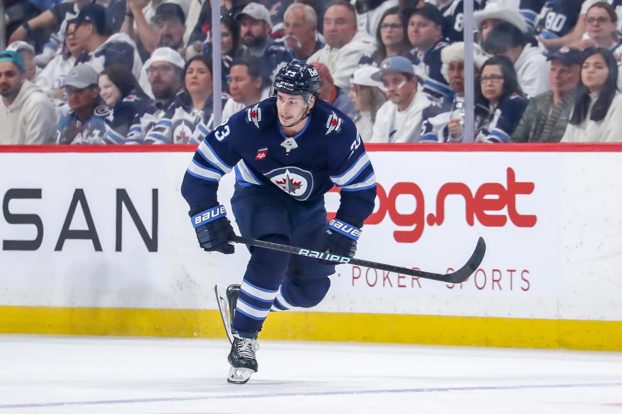 WINNIPEG, CANADA - APRIL 30: Sean Monahan #23 of the Winnipeg Jets follows the play down the ice during first period action against the Colorado Avalanche in Game Five of the First Round of the 2024 Stanley Cup Playoffs at the Canada Life Centre on April 30, 2024 in Winnipeg, Manitoba, Canada. The Avs defeated the Jets 6-3 and win the series 4-1. (Photo by Darcy Finley/NHLI via Getty Images)