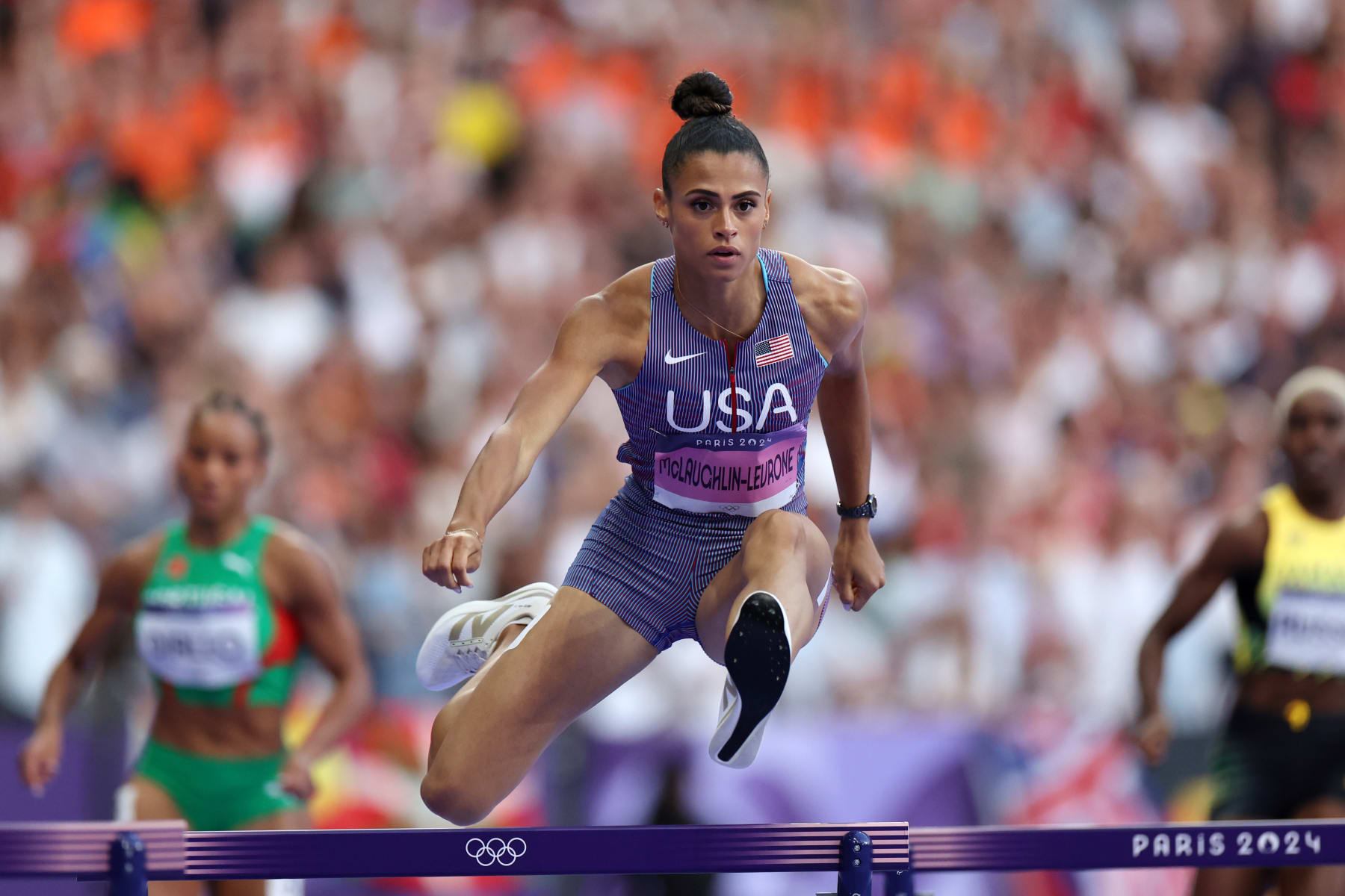 PARIS, FRANCE - AUGUST 06: Sydney McLaughlin-Levrone of Team United States competes during the Women's 400m Hurdles Semi-Final on day eleven of the Olympic Games Paris 2024 at Stade de France on August 06, 2024 in Paris, France. (Photo by Hannah Peters/Getty Images)
