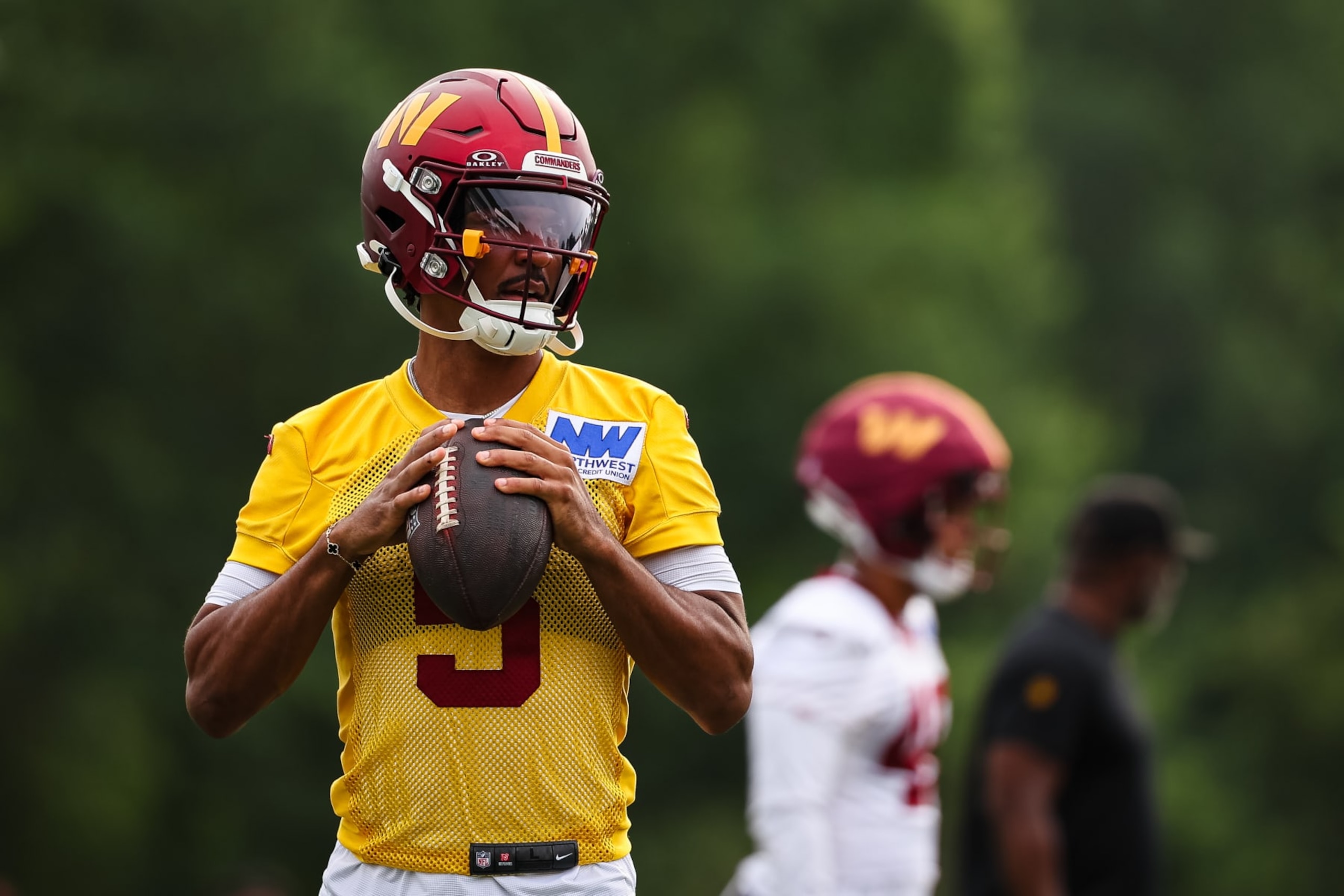 ASHBURN, VA - JULY 25: Jayden Daniels #5 of the Washington Commanders looks to pass during training camp at OrthoVirginia Training Center at Commanders Park on July 25, 2024 in Ashburn, Virginia. (Photo by Scott Taetsch/Getty Images) ASHBURN, VA - JULY 25: Jayden Daniels #5 of the Washington Commanders looks to pass during training camp at OrthoVirginia Training Center at Commanders Park on July 25, 2024 in Ashburn, Virginia. (Photo by Scott Taetsch/Getty Images)