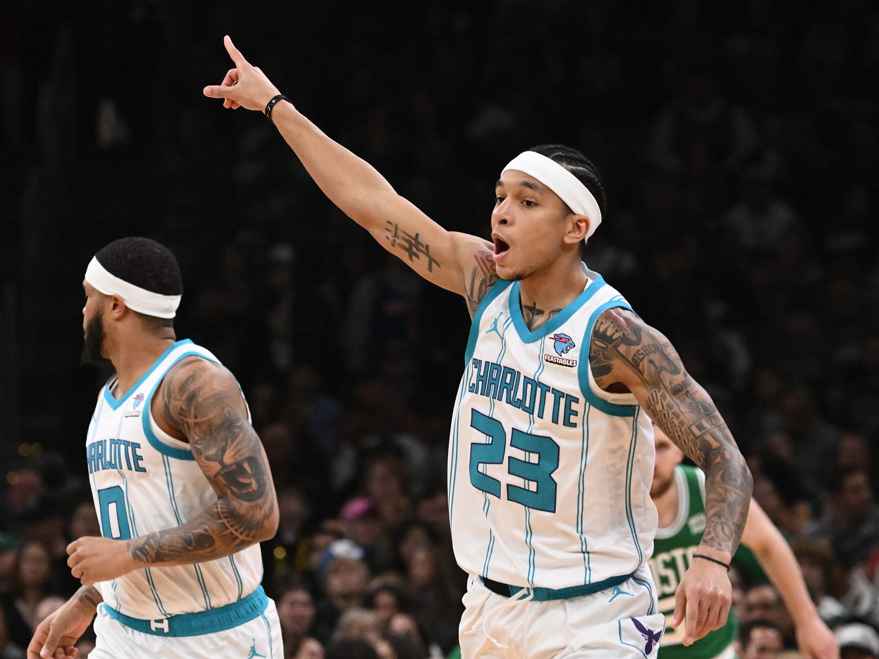 BOSTON, MASSACHUSETTS - APRIL 12: Tre Mann #23 of the Charlotte Hornets reacts after making a three-point basket against the Boston Celtics during the first quarter at the TD Garden on April 12, 2024 in Boston, Massachusetts. NOTE TO USER: User expressly acknowledges and agrees that, by downloading and or using this photograph, User is consenting to the terms and conditions of the Getty Images License Agreement. (Photo by Brian Fluharty/Getty Images)