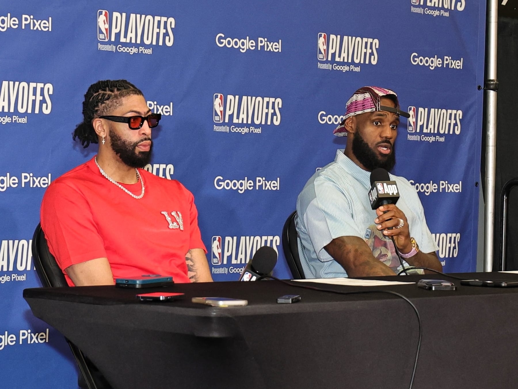 LOS ANGELES, CA - APRIL 25: Anthony Davis #3 and LeBron James #23 of the Los Angeles Lakers talk to the media after the game Denver Nuggets during Round 1 Game 3 of the 2024 NBA Playoffs on April 25, 2024 at Crypto.Com Arena in Los Angeles, California. NOTE TO USER: User expressly acknowledges and agrees that, by downloading and/or using this Photograph, user is consenting to the terms and conditions of the Getty Images License Agreement. Mandatory Copyright Notice: Copyright 2024 NBAE (Photo by Jim Poorten/NBAE via Getty Images)
