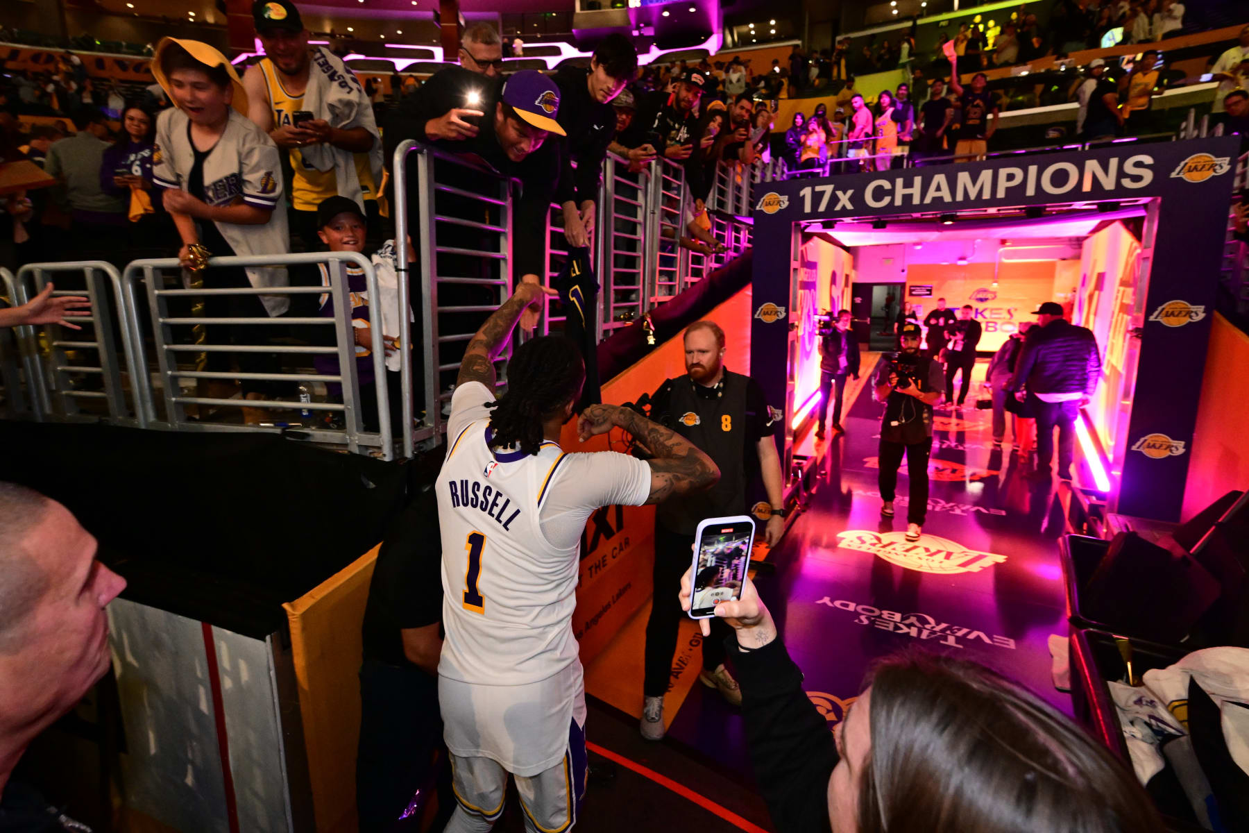 LOS ANGELES, CA - APRIL 27: D'Angelo Russell #1 of the Los Angeles Lakers greets the fans after the game against the Denver Nuggets during Round 1 Game 4 of the 2024 NBA Playoffs on April 27, 2024 at Crypto.Com Arena in Los Angeles, California. NOTE TO USER: User expressly acknowledges and agrees that, by downloading and/or using this Photograph, user is consenting to the terms and conditions of the Getty Images License Agreement. Mandatory Copyright Notice: Copyright 2024 NBAE (Photo by Adam Pantozzi/NBAE via Getty Images)