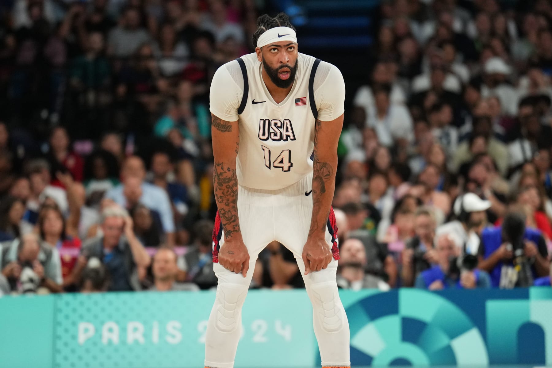 PARIS, FRANCE - AUGUST 8: Anthony Davis #14 of the USA Men's National Team looks on during the game during the Men's Semi-Finals on August 8, 2024 at the AccorHotels Arena in Paris, France. NOTE TO USER: User expressly acknowledges and agrees that, by downloading and/or using this photograph, user is consenting to the terms and conditions of the Getty Images License Agreement. Mandatory Copyright Notice: Copyright 2024 NBAE (Photo by Jesse D. Garrabrant/NBAE via Getty Images) PARIS, FRANCE - AUGUST 8: Anthony Davis #14 of the USA Men's National Team looks on during the game during the Men's Semi-Finals on August 8, 2024 at the AccorHotels Arena in Paris, France. NOTE TO USER: User expressly acknowledges and agrees that, by downloading and/or using this photograph, user is consenting to the terms and conditions of the Getty Images License Agreement. Mandatory Copyright Notice: Copyright 2024 NBAE (Photo by Jesse D. Garrabrant/NBAE via Getty Images)