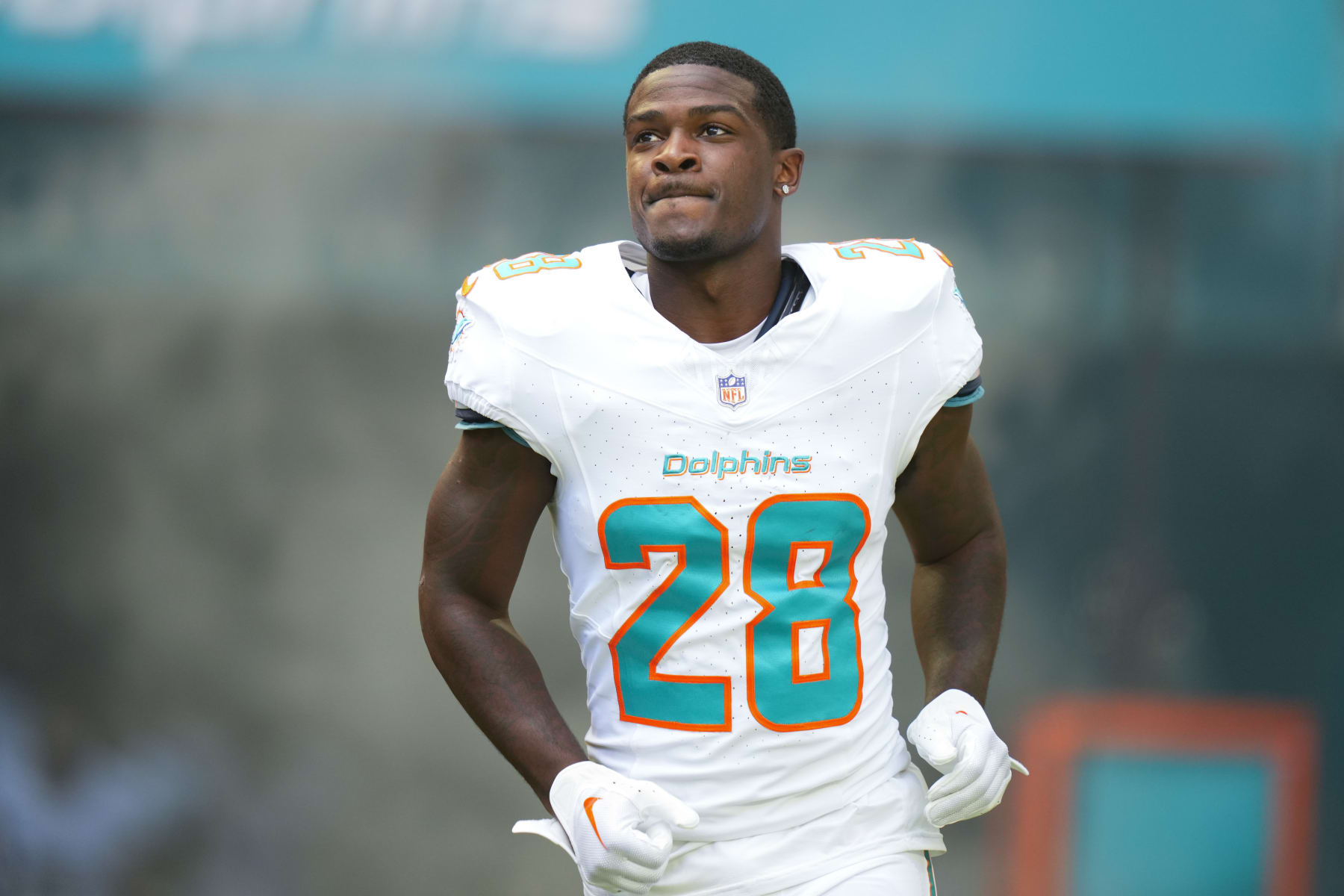 MIAMI GARDENS, FLORIDA - DECEMBER 17: De'Von Achane #28 of the Miami Dolphins enters the field prior to a game against the New York Jets at Hard Rock Stadium on December 17, 2023 in Miami Gardens, Florida. (Photo by Rich Storry/Getty Images)