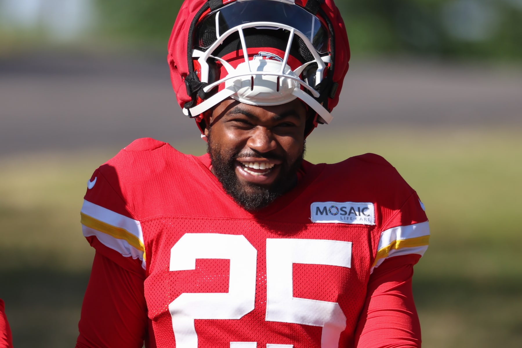ST. JOSEPH, MO - AUGUST 02: Kansas City Chiefs running back Clyde Edwards-Helaire (25) smiles during training camp on August 2, 2024 at Missouri Western State University in St. Joseph, MO. (Photo by Scott Winters/Icon Sportswire via Getty Images)