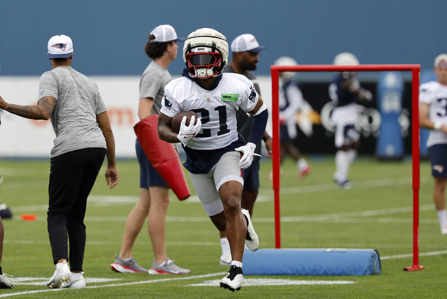 FOXBOROUGH, MA - JULY 28: New England Patriots running back Antonio Gibson (21) carries the ball during New England Patriots Training Camp on July 28, 2024, at Gillette Stadium in Foxborough, Massachusetts. (Photo by Fred Kfoury III/Icon Sportswire via Getty Images)