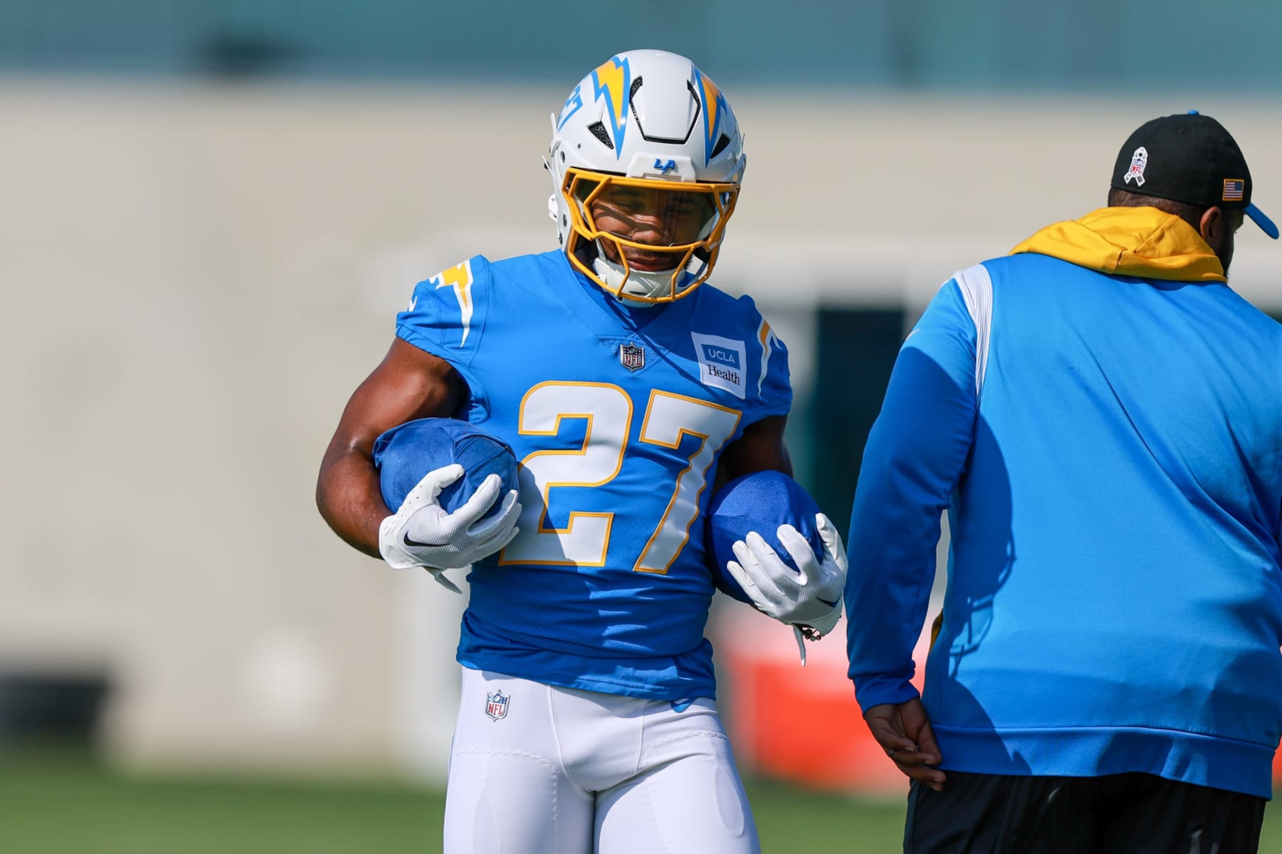 EL SEGUNDO, CA - JULY 24: Los Angeles Chargers running back J.K. Dobbins (27) holds the ball during drills during the Los Angeles Chargers Training Camp on July 24, 2024, at The Bolt in El Segundo, CA. (Photo by Jordon Kelly/Icon Sportswire via Getty Images)