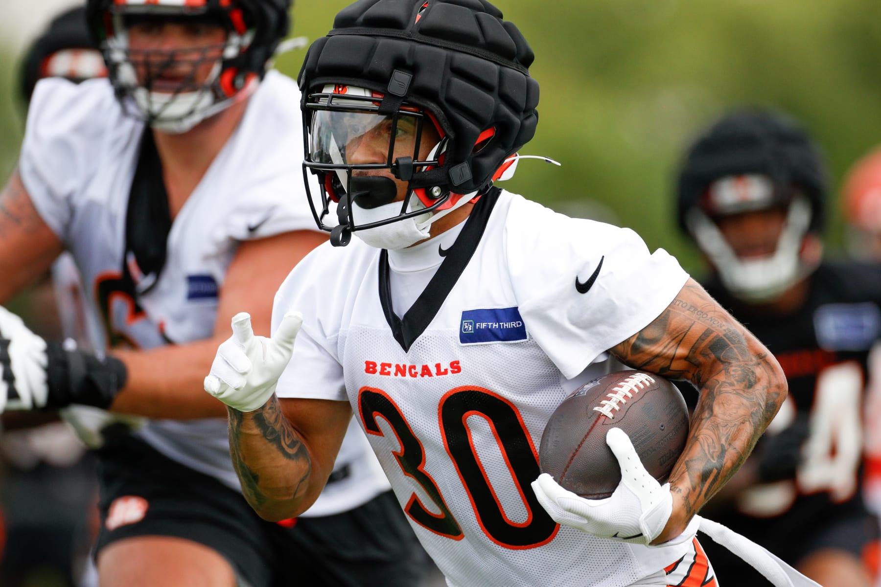 CINCINNATI, OH - JULY 29: Cincinnati Bengals running back Chase Brown (30) carries the ball during the Cincinnati Bengals training camp at Kettering Health Practice Fields on July 29, 2024 in Cincinnati, Ohio. (Photo by Ian Johnson/Icon Sportswire via Getty Images)