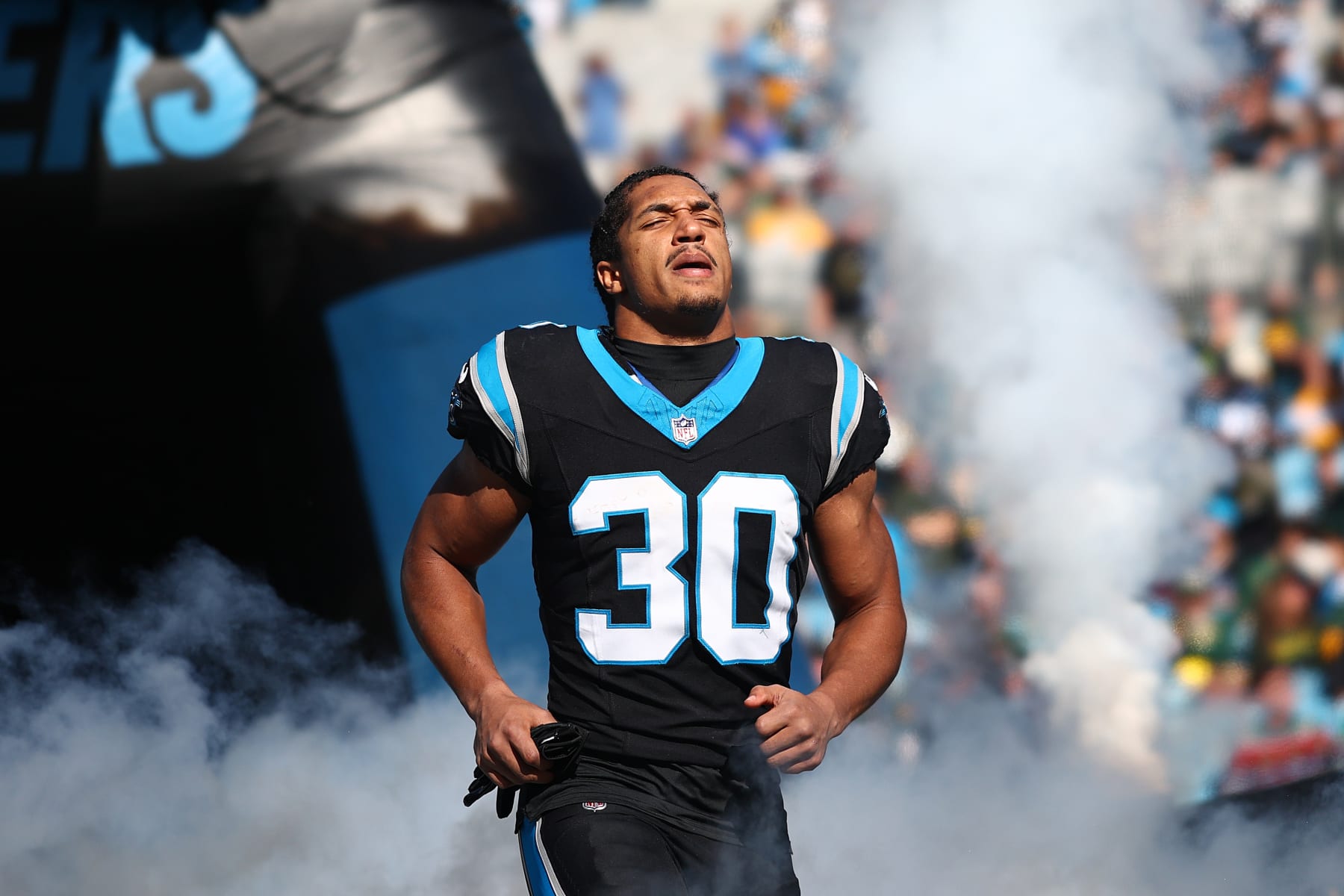 CHARLOTTE, NORTH CAROLINA - DECEMBER 24: Chuba Hubbard #30 of the Carolina Panthers walks onto the field before the game against the Green Bay Packers at Bank of America Stadium on December 24, 2023 in Charlotte, North Carolina. (Photo by Jared C. Tilton/Getty Images)