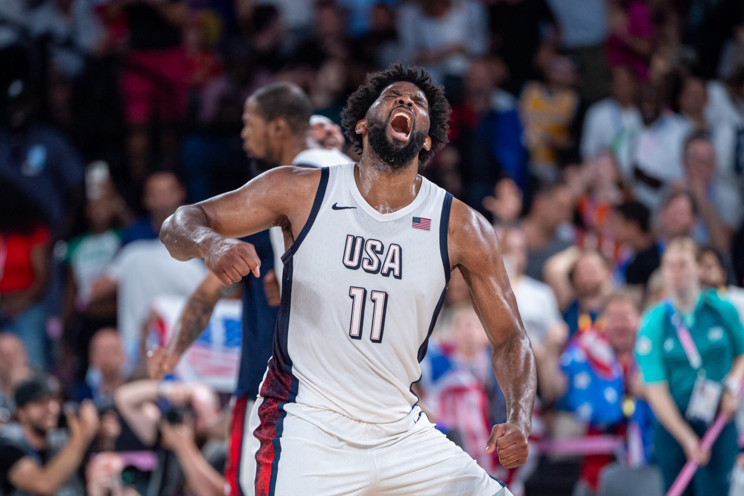 PARIS, FRANCE - AUGUST 8: Joel Embiid #11 of United States celebrates during a Men's basketball semifinals match between Team United States and Team Serbia on day thirteen of the Olympic Games Paris 2024 at Bercy Arena on August 08, 2024 in Paris, France. (Photo by RvS.Media/Robert Hradil/Getty Images) PARIS, FRANCE - AUGUST 8: Joel Embiid #11 of United States celebrates during a Men's basketball semifinals match between Team United States and Team Serbia on day thirteen of the Olympic Games Paris 2024 at Bercy Arena on August 08, 2024 in Paris, France. (Photo by RvS.Media/Robert Hradil/Getty Images)