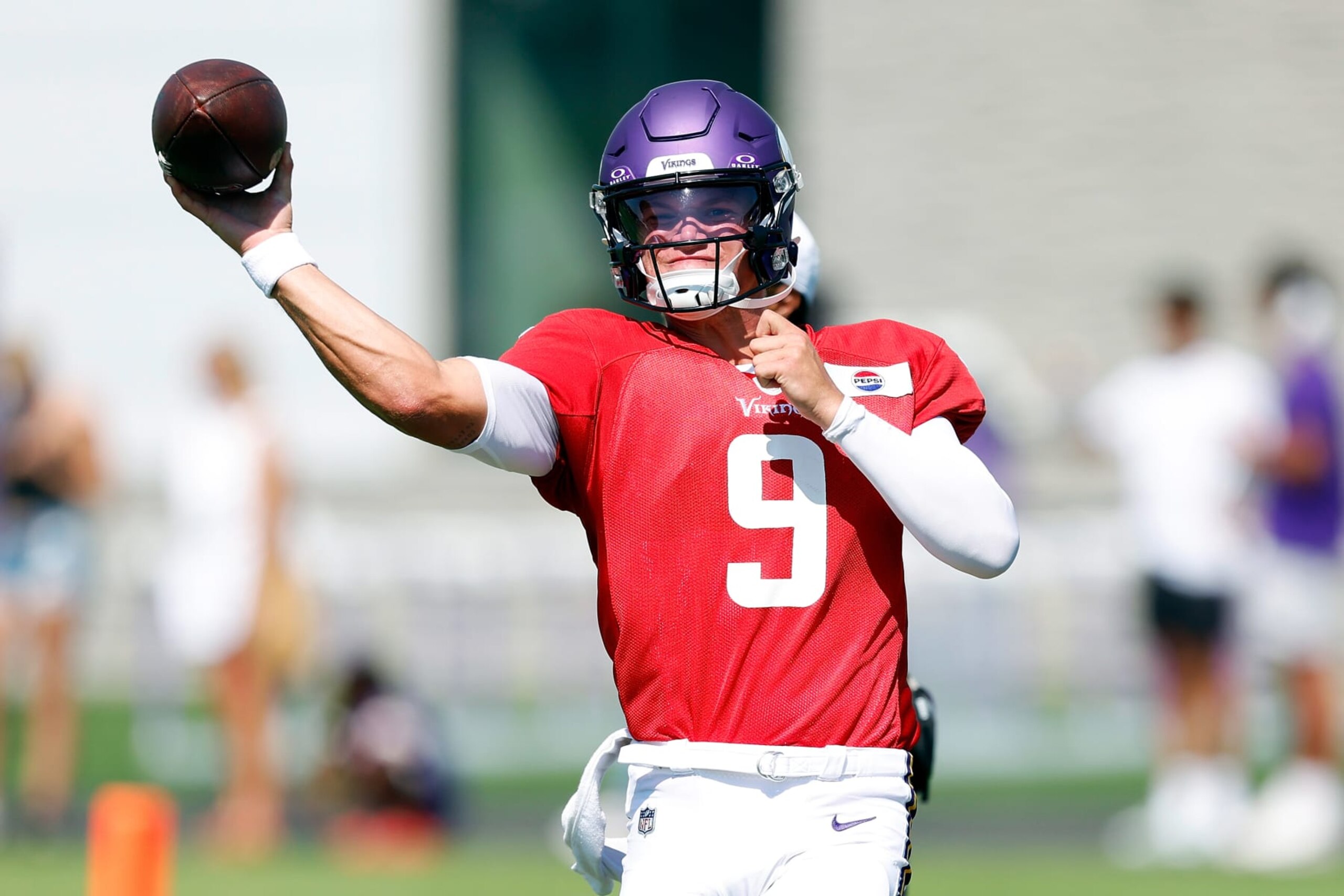 EAGAN, MINNESOTA - AUGUST 02: J.J. McCarthy #9 of the Minnesota Vikings participates in a drill during training camp on August 02, 2024 in Eagan, Minnesota. (Photo by David Berding/Getty Images) EAGAN, MINNESOTA - AUGUST 02: J.J. McCarthy #9 of the Minnesota Vikings participates in a drill during training camp on August 02, 2024 in Eagan, Minnesota. (Photo by David Berding/Getty Images)