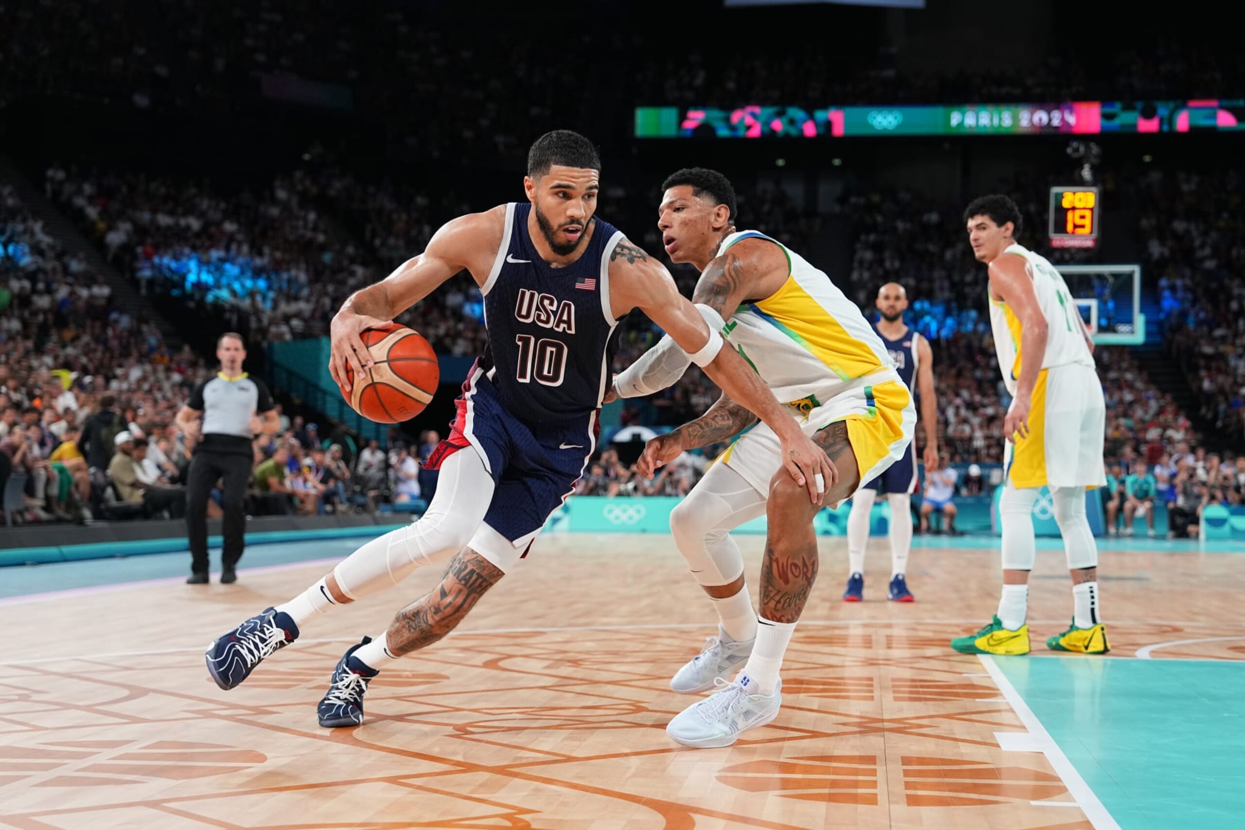 PARIS, FRANCE - AUGUST 6: Jayson Tatum #10 of Team USA drives to the basket during the game against Team Brazil on August 6, 2024 at the AccorHotels Arena in Paris, France. NOTE TO USER: User expressly acknowledges and agrees that, by downloading and/or using this photograph, user is consenting to the terms and conditions of the Getty Images License Agreement. Mandatory Copyright Notice: Copyright 2024 NBAE (Photo by Garrett Ellwood/NBAE via Getty Images)