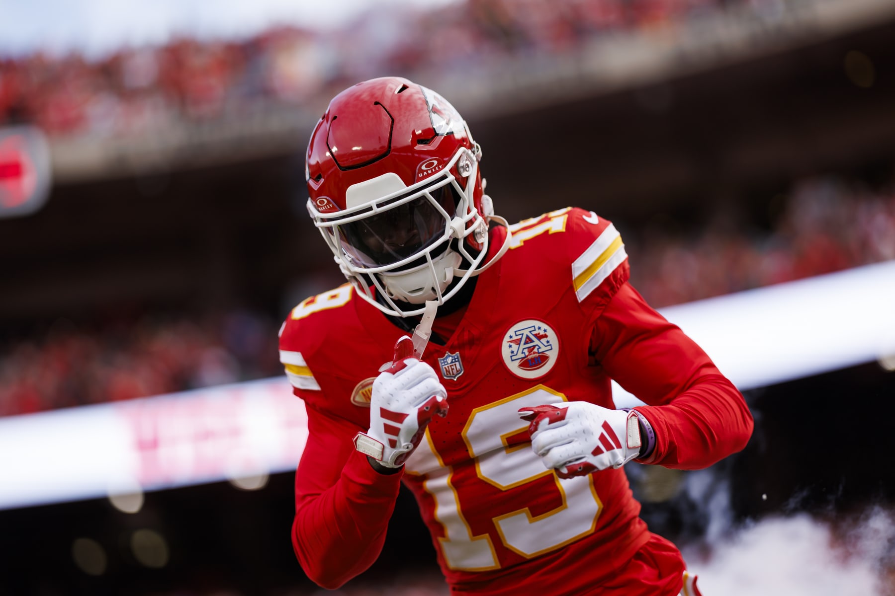KANSAS CITY, MISSOURI - DECEMBER 10: Kadarius Toney #19 of the Kansas City Chiefs celebrates as he runs onto the field during player introductions before an NFL football game against the Buffalo Bills at GEHA Field at Arrowhead Stadium on December 10, 2023 in Kansas City, Missouri. (Photo by Ryan Kang/Getty Images)