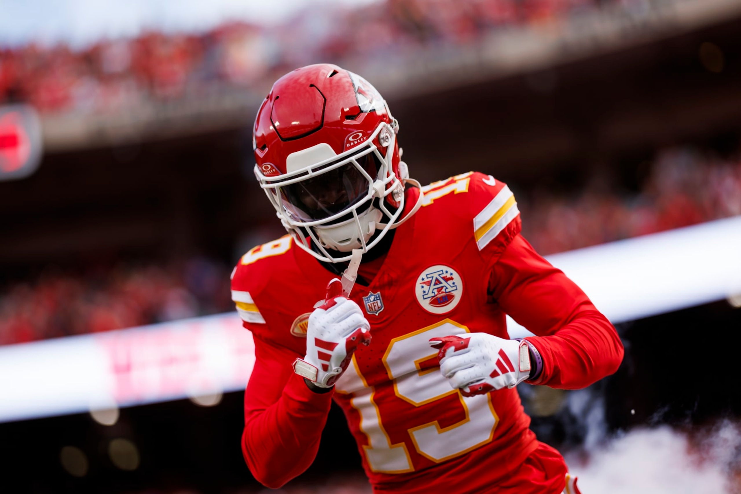 KANSAS CITY, MISSOURI - DECEMBER 10: Kadarius Toney #19 of the Kansas City Chiefs celebrates as he runs onto the field during player introductions before an NFL football game against the Buffalo Bills at GEHA Field at Arrowhead Stadium on December 10, 2023 in Kansas City, Missouri. (Photo by Ryan Kang/Getty Images) KANSAS CITY, MISSOURI - DECEMBER 10: Kadarius Toney #19 of the Kansas City Chiefs celebrates as he runs onto the field during player introductions before an NFL football game against the Buffalo Bills at GEHA Field at Arrowhead Stadium on December 10, 2023 in Kansas City, Missouri. (Photo by Ryan Kang/Getty Images)