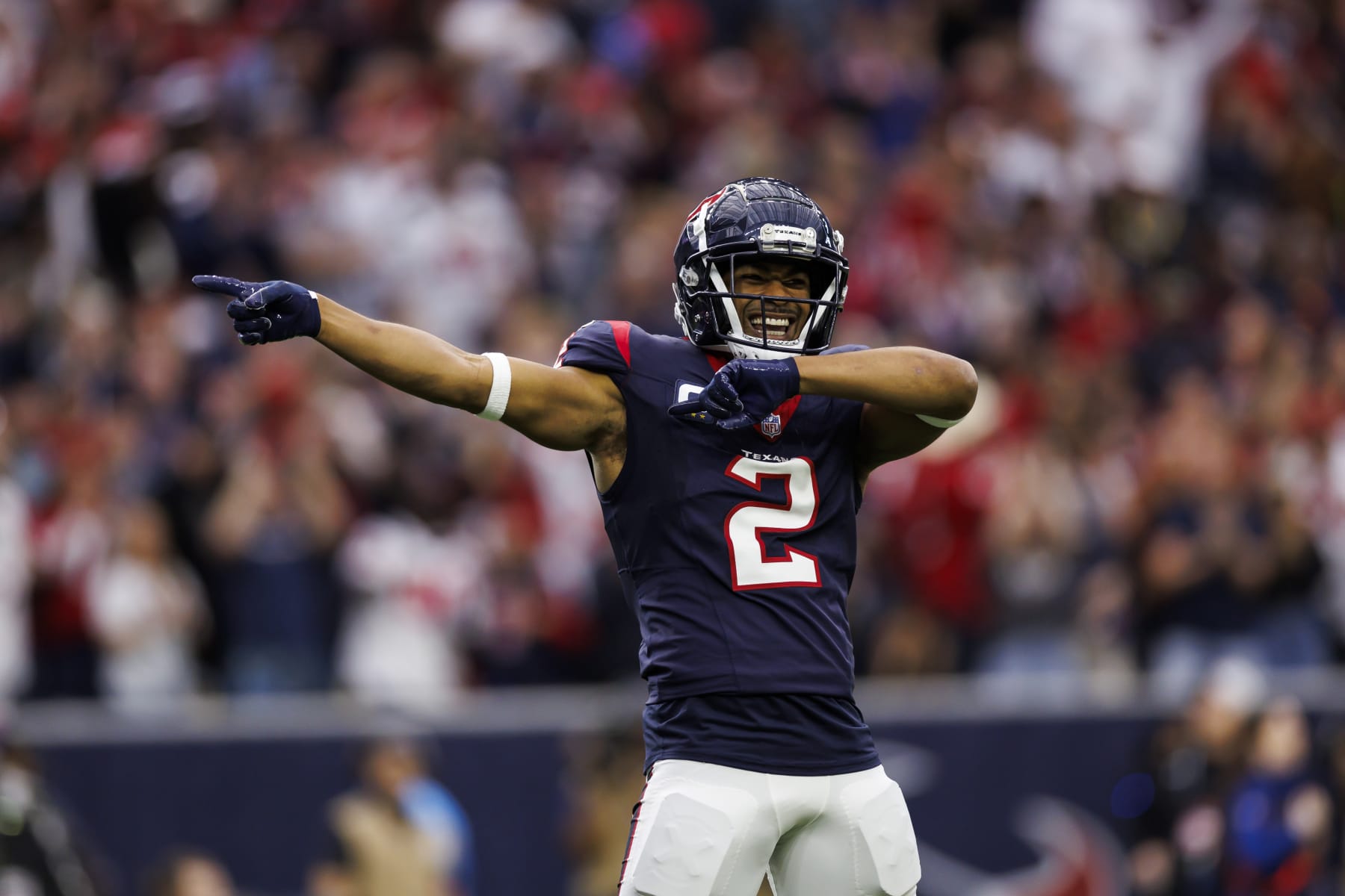HOUSTON, TEXAS - JANUARY 13: Robert Woods #2 of the Houston Texans celebrates after a catch during an AFC wild-card playoff football game against the Cleveland Browns at NRG Stadium on January 13, 2024 in Houston, Texas. (Photo by Ryan Kang/Getty Images)