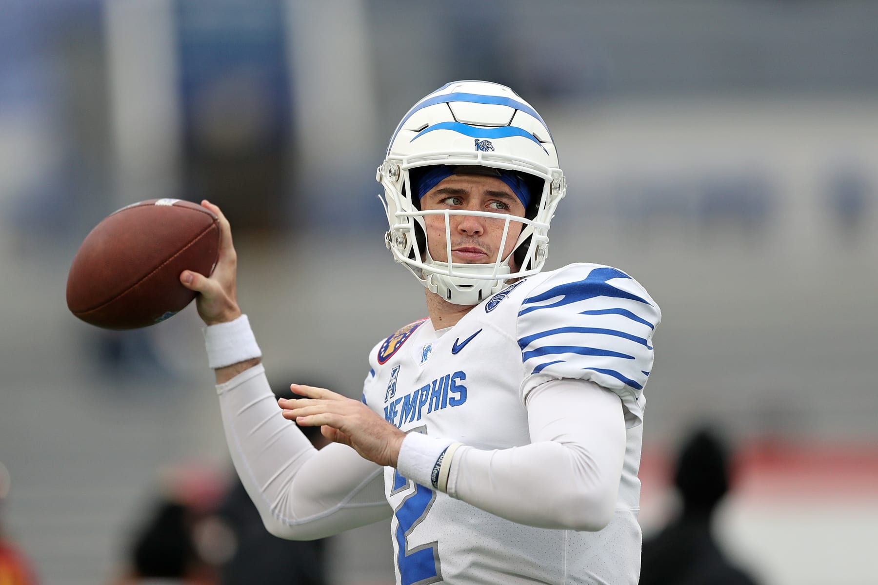 MEMPHIS, TENNESSEE - DECEMBER 29: Seth Henigan #2 of the Memphis Tigers warms up before the 2023 AutoZone Liberty Bowl game against the Iowa State Cyclones at Simmons Bank Liberty Stadium on December 29, 2023 in Memphis, Tennessee. (Photo by Justin Ford/Getty Images)