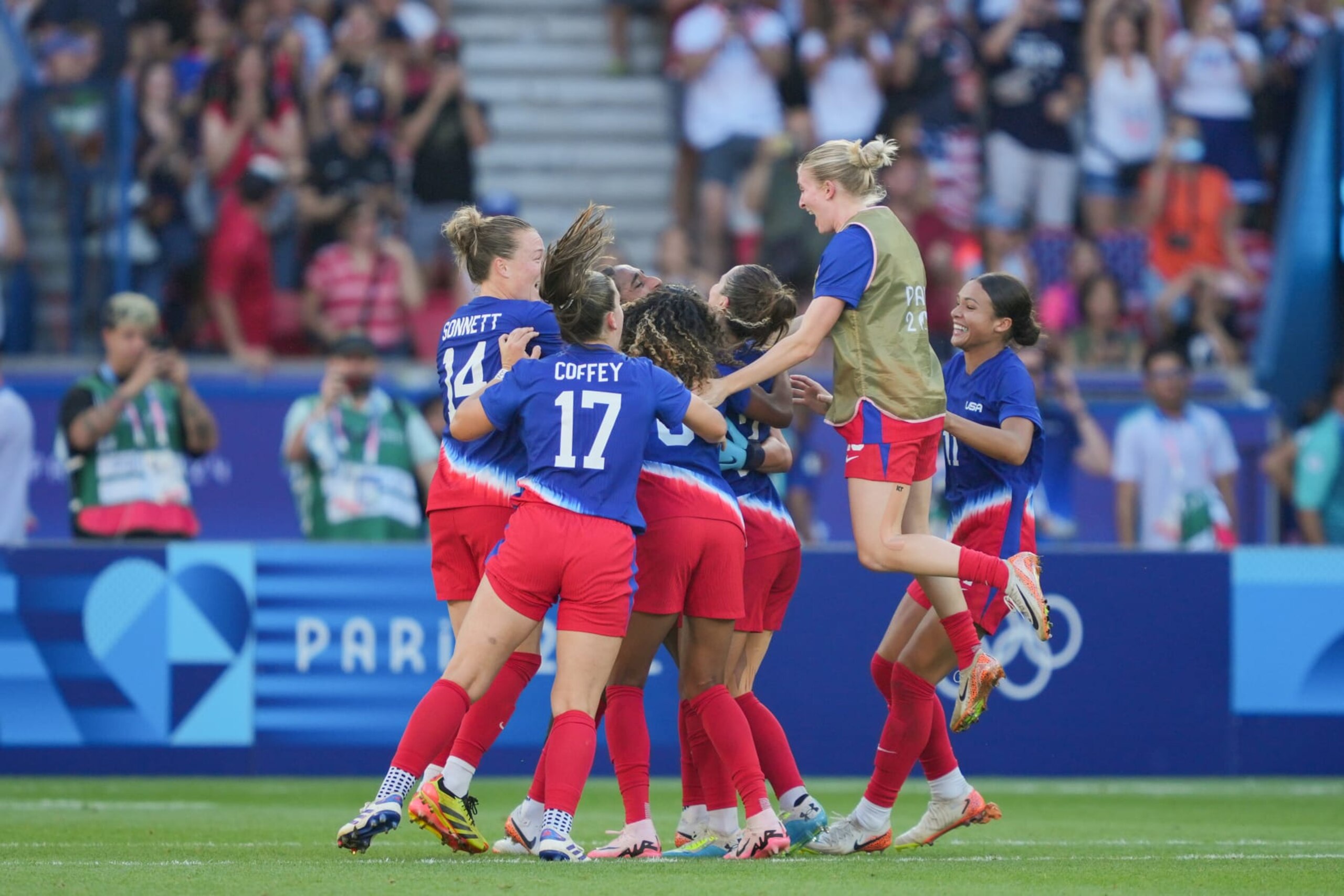 PARIS, FRANCE - AUGUST 10: The United States women's soccer team celebrate defeating Brazil after the Women's Gold Medal match during the Olympic Games Paris 2024 at Parc des Princes on August 10, 2024 in Paris, France. (Photo by John Todd/ISI/Getty Images)