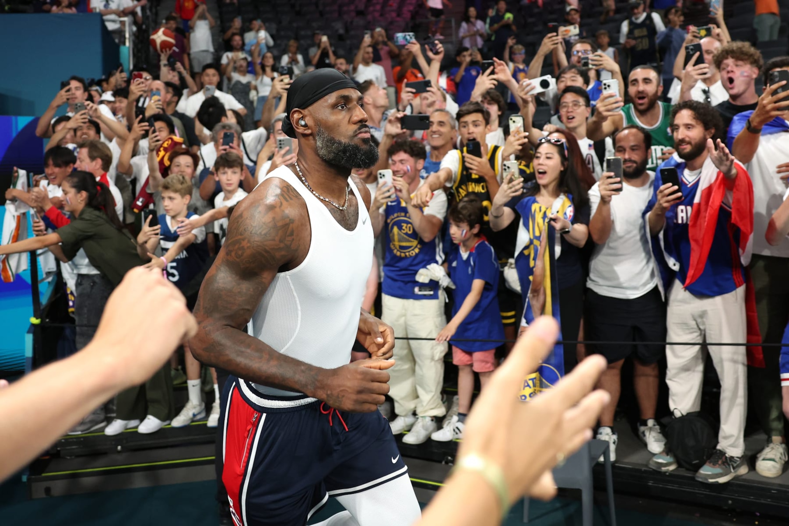 PARIS, FRANCE - AUGUST 10: Lebron James #6 of Team United States runs onto the court prior to the Men's Gold Medal game between Team France and Team United States on day fifteen of the Olympic Games Paris 2024 at Bercy Arena on August 10, 2024 in Paris, France. (Photo by Ezra Shaw/Getty Images)