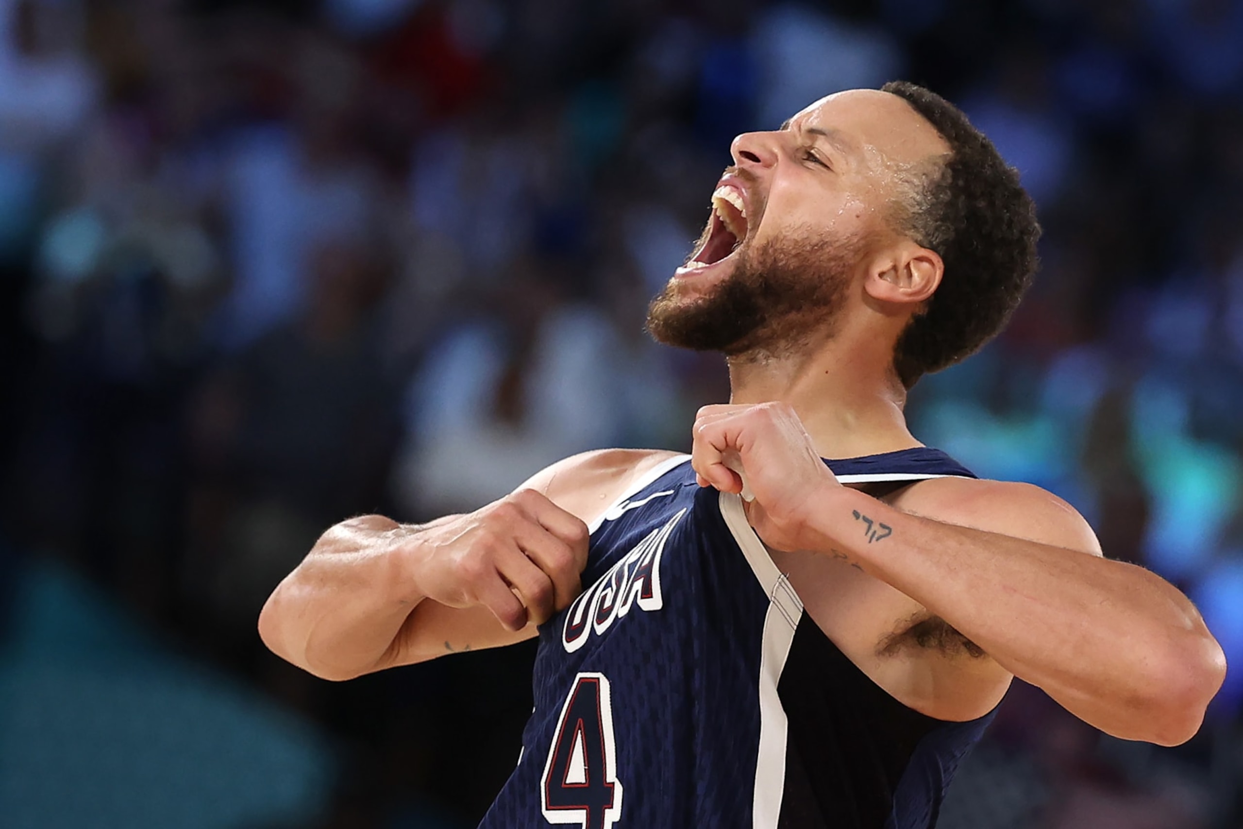 PARIS, FRANCE - AUGUST 10: Stephen Curry #4 of Team United States reacts after a three point basket during the Men's Gold Medal game between Team France and Team United States on day fifteen of the Olympic Games Paris 2024 at Bercy Arena on August 10, 2024 in Paris, France. (Photo by Ezra Shaw/Getty Images)