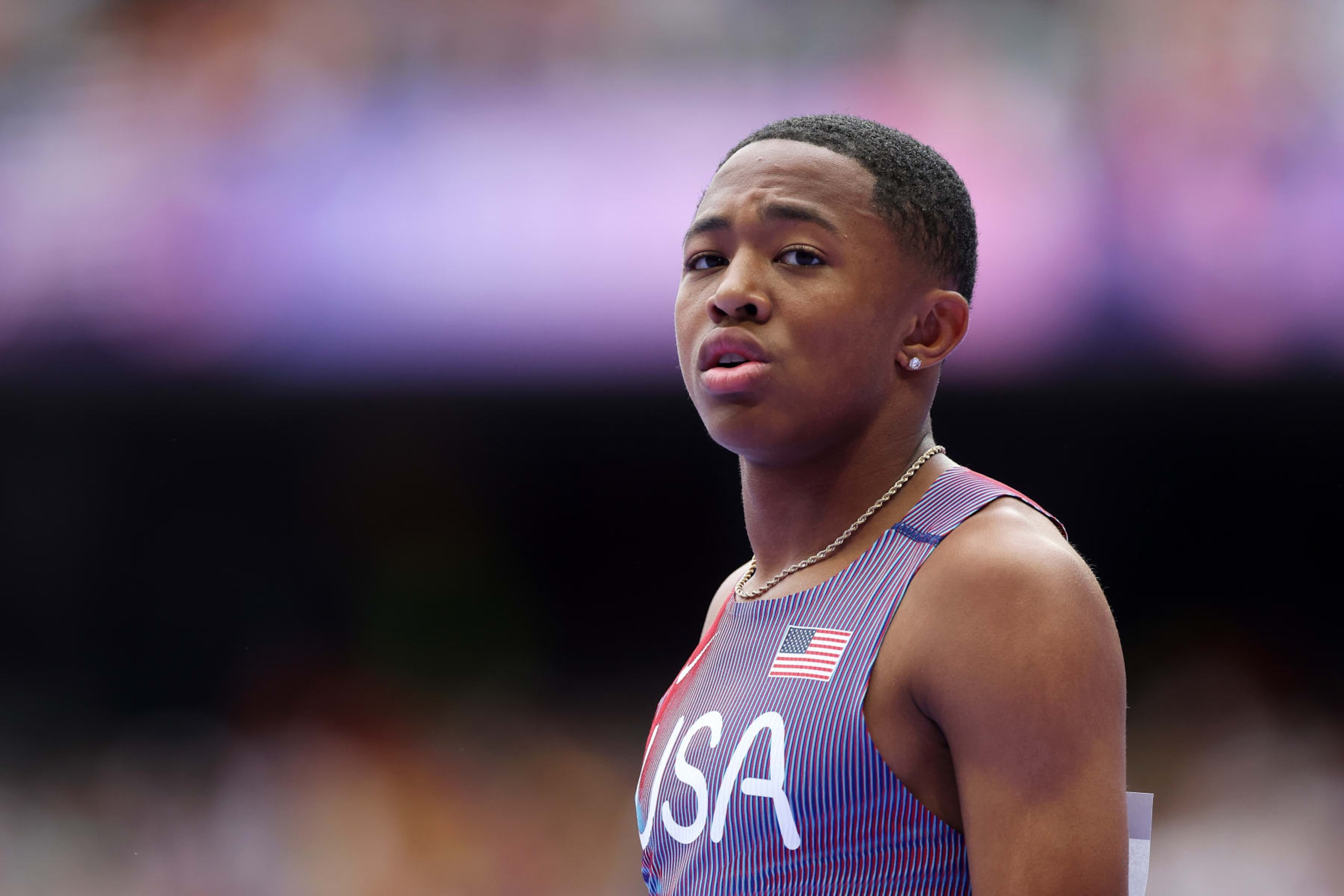 PARIS, FRANCE - AUGUST 09: Quincy Wilson of Team United States looks on during the Men's 4 x 400m Relay Round 1 on day fourteen of the Olympic Games Paris 2024 at Stade de France on August 09, 2024 in Paris, France. (Photo by Christian Petersen/Getty Images)