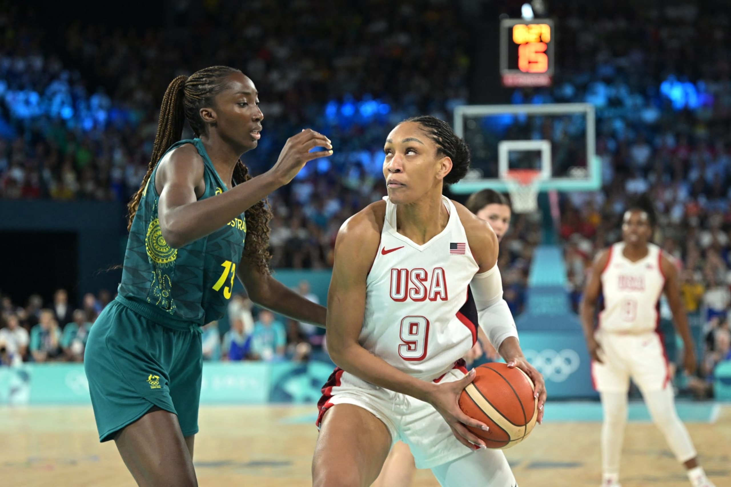 USA's #09 A'ja Wilson challenges Australia's #13 Ezi Magbegor in the women's semifinal basketball match between USA and Australia during the Paris 2024 Olympic Games at the Bercy Arena in Paris on August 9, 2024. (Photo by Damien MEYER / AFP) (Photo by DAMIEN MEYER/AFP via Getty Images)