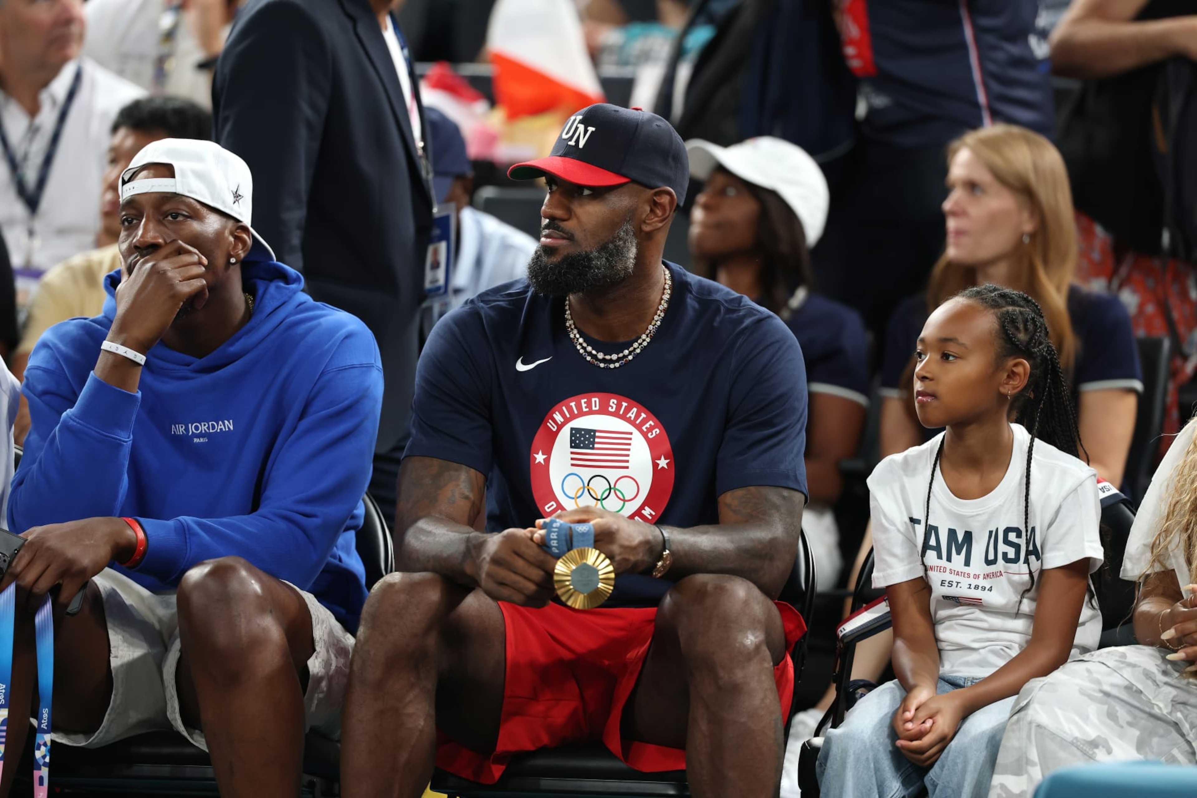 PARIS, FRANCE - AUGUST 11: Bam Adebayo and Lebron James of Team United States attend the Women's Gold Medal game between Team France and Team United States on day sixteen of the Olympic Games Paris 2024 at Bercy Arena on August 11, 2024 in Paris, France. (Photo by Gregory Shamus/Getty Images) PARIS, FRANCE - AUGUST 11: Bam Adebayo and Lebron James of Team United States attend the Women's Gold Medal game between Team France and Team United States on day sixteen of the Olympic Games Paris 2024 at Bercy Arena on August 11, 2024 in Paris, France. (Photo by Gregory Shamus/Getty Images)