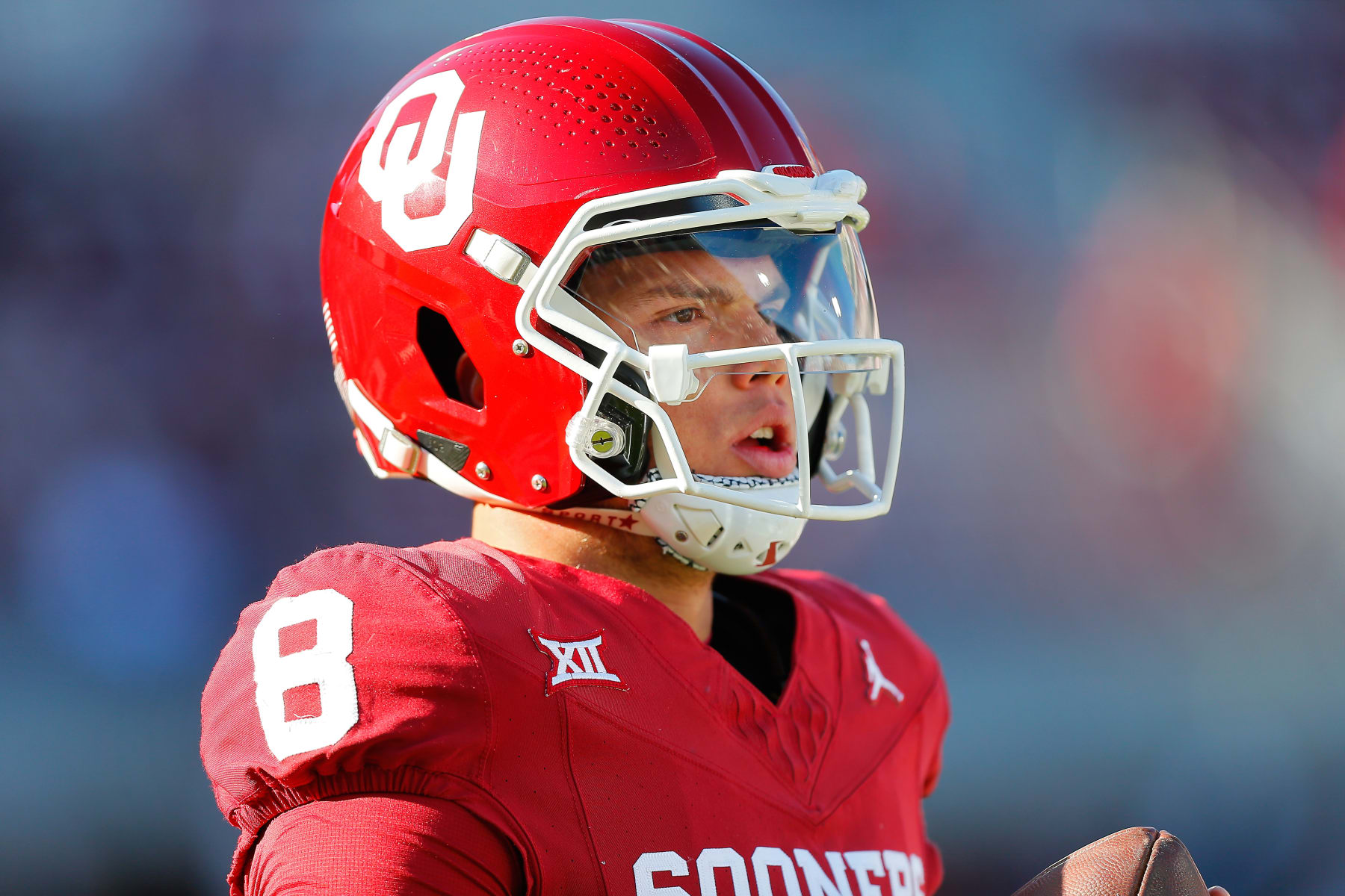 NORMAN, OKLAHOMA - NOVEMBER 24:  Quarterback Dillon Gabriel #8 of the Oklahoma Sooners warms up before a game against the TCU Horned Frogs at Gaylord Family Oklahoma Memorial Stadium on November 24, 2023 in Norman, Oklahoma.  Oklahoma won 69-45. (Photo by Brian Bahr/Getty Images)