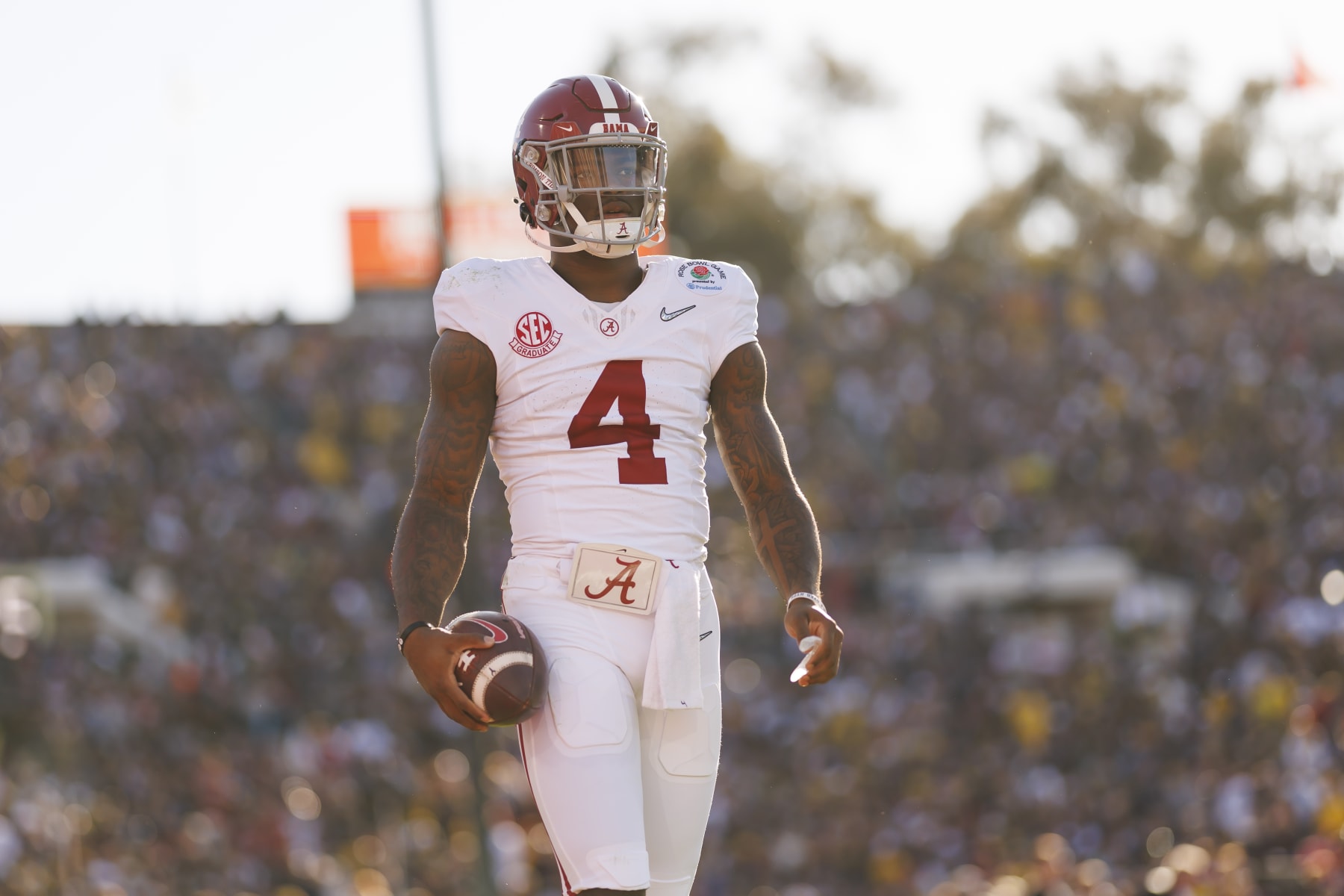 PASADENA, CALIFORNIA - JANUARY 01: Quarterback Jalen Milroe #4 of the Alabama Crimson Tide looks on from the sideline during the CFP Semifinal Rose Bowl Game against the Michigan Wolverines at Rose Bowl Stadium on January 1, 2024 in Pasadena, California. (Photo by Ryan Kang/Getty Images)
