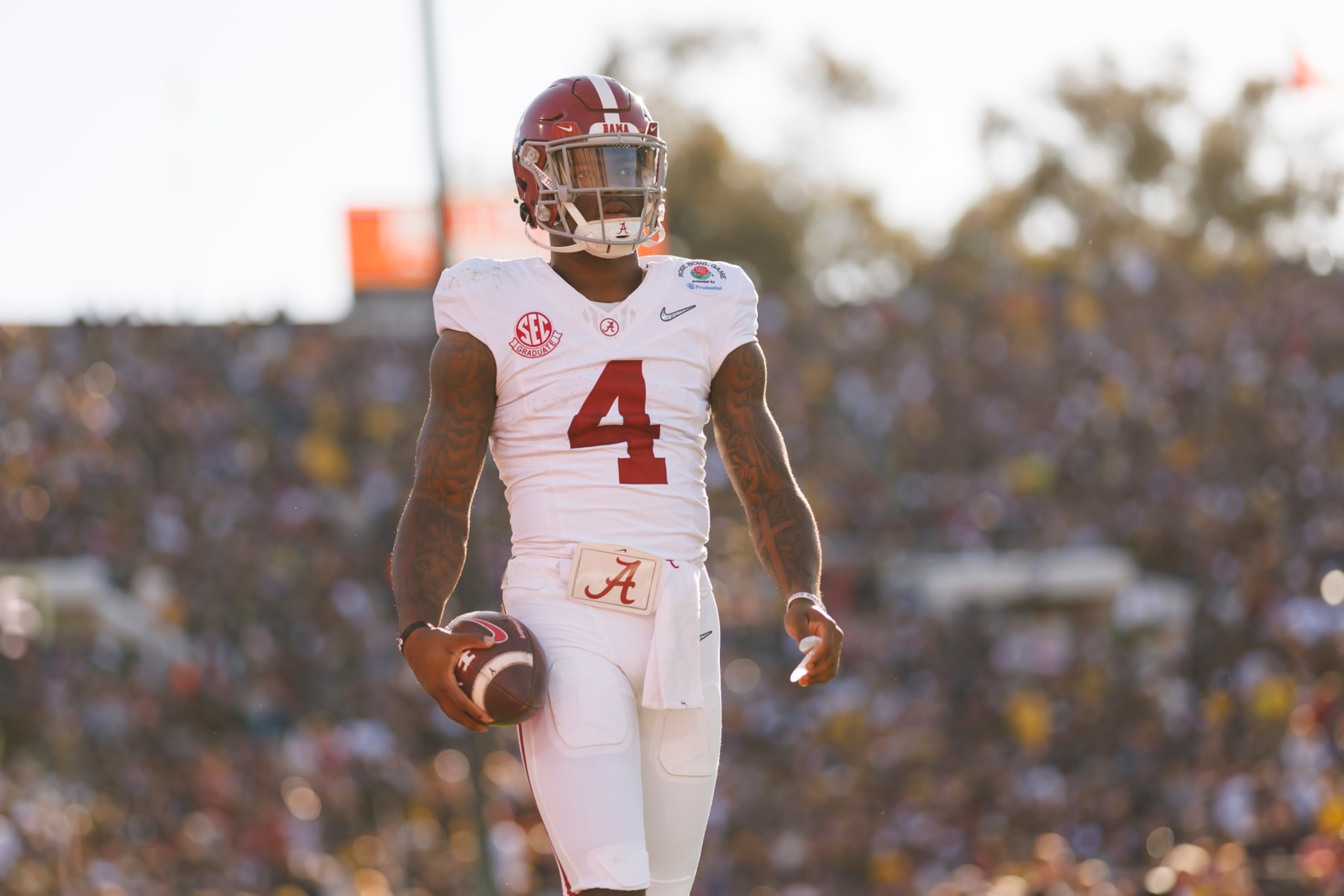 PASADENA, CALIFORNIA - JANUARY 01: Quarterback Jalen Milroe #4 of the Alabama Crimson Tide looks on from the sideline during the CFP Semifinal Rose Bowl Game against the Michigan Wolverines at Rose Bowl Stadium on January 1, 2024 in Pasadena, California. (Photo by Ryan Kang/Getty Images)