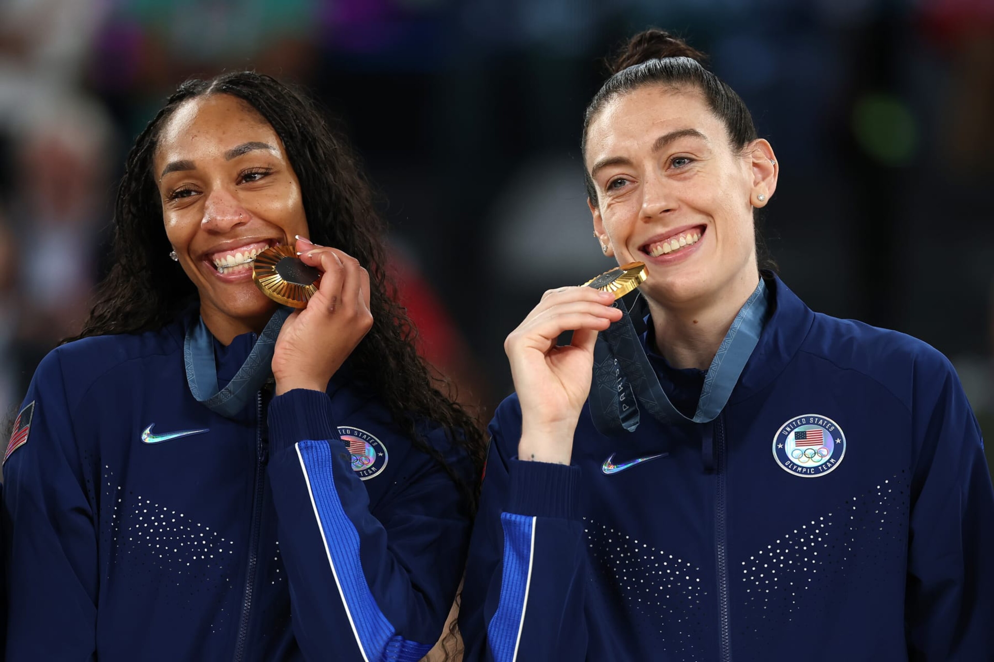 PARIS, FRANCE - AUGUST 11: Gold medalists A'Ja Wilson #9 and Breanna Stewart #10 of Team United States poses for a photo while on the podium during the Women's basketball medal ceremony on day sixteen of the Olympic Games Paris 2024 at Bercy Arena on August 11, 2024 in Paris, France. (Photo by Gregory Shamus/Getty Images) PARIS, FRANCE - AUGUST 11: Gold medalists A'Ja Wilson #9 and Breanna Stewart #10 of Team United States poses for a photo while on the podium during the Women's basketball medal ceremony on day sixteen of the Olympic Games Paris 2024 at Bercy Arena on August 11, 2024 in Paris, France. (Photo by Gregory Shamus/Getty Images)