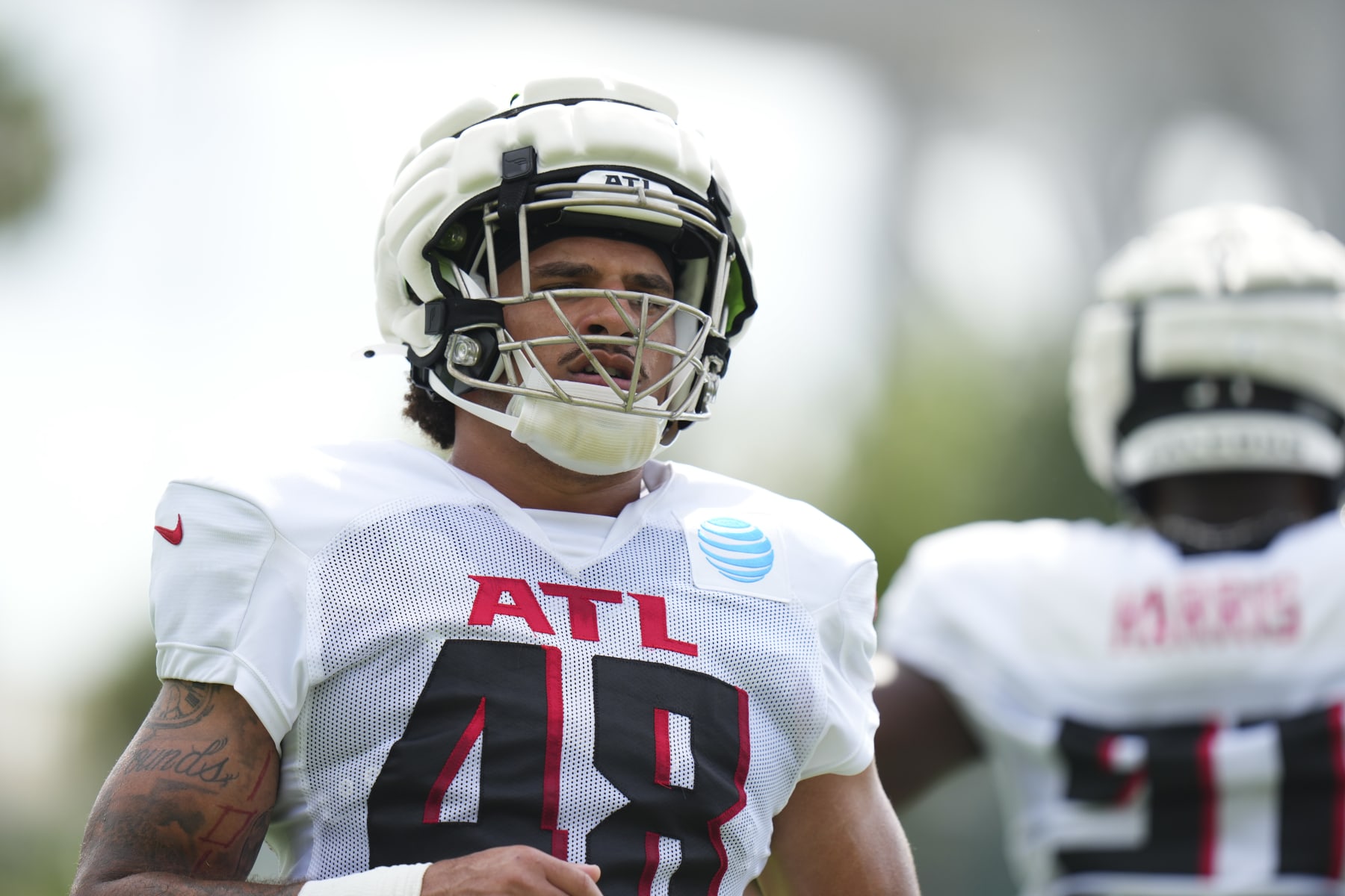 MIAMI GARDENS, FLORIDA - AUGUST 07: Bralen Trice #48 of the Atlanta Falcons looks on during training camp practice with the Miami Dolphins on August 07, 2024 in Miami Gardens, Florida. (Photo by Rich Storry/Getty Images)
