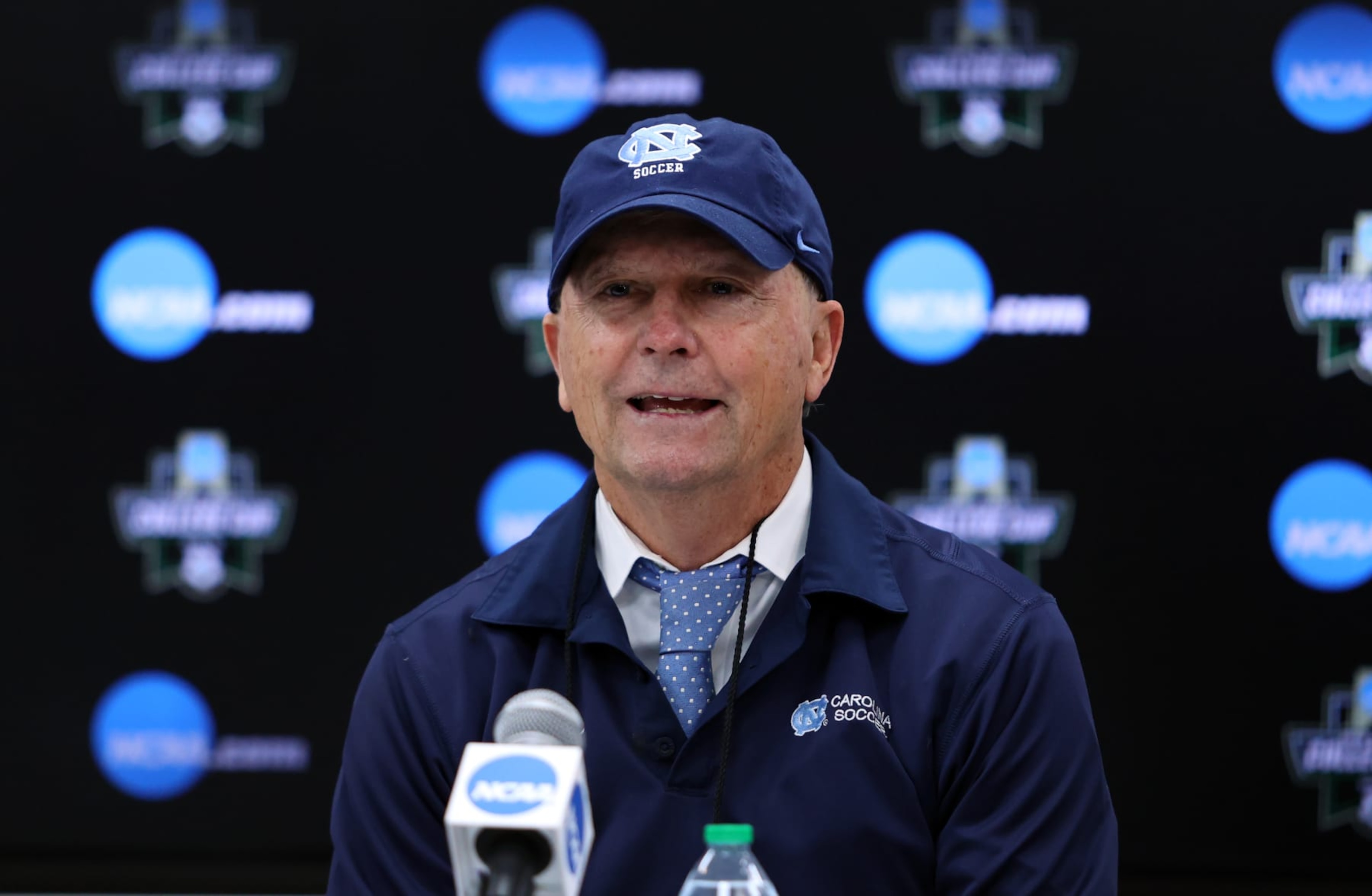 CARY, NC - DECEMBER 5: Head coach Anson Dorrance of the University of North Carolina during the postgame press conference of the 2020 Women's College Cup Final between North Carolina and UCLA at Sahlen's Stadium at WakeMed Soccer Park on December 5, 2022 in Cary, North Carolina. (Photo by Andy Mead/ISI Photos/Getty Images). CARY, NC - DECEMBER 5: Head coach Anson Dorrance of the University of North Carolina during the postgame press conference of the 2020 Women's College Cup Final between North Carolina and UCLA at Sahlen's Stadium at WakeMed Soccer Park on December 5, 2022 in Cary, North Carolina. (Photo by Andy Mead/ISI Photos/Getty Images).