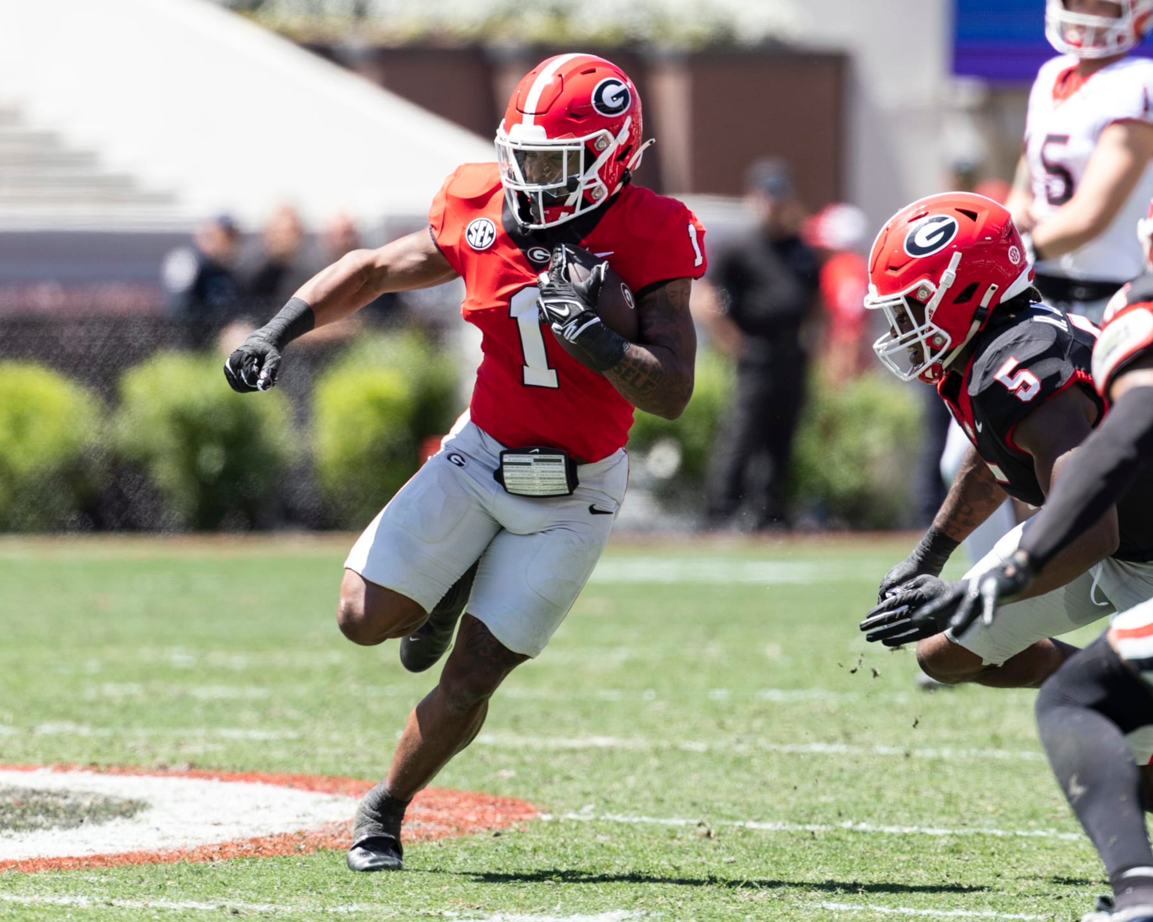 ATHENS, GA - APRIL 13: Trevor Etienne #1 of the Georgia Bulldogs runs with the ball during the University of Georgia Spring Game at Sanford Stadium on April 13, 2024 in Athens, Georgia. (Photo by Steve Limentani/ISI Photos/Getty Images)