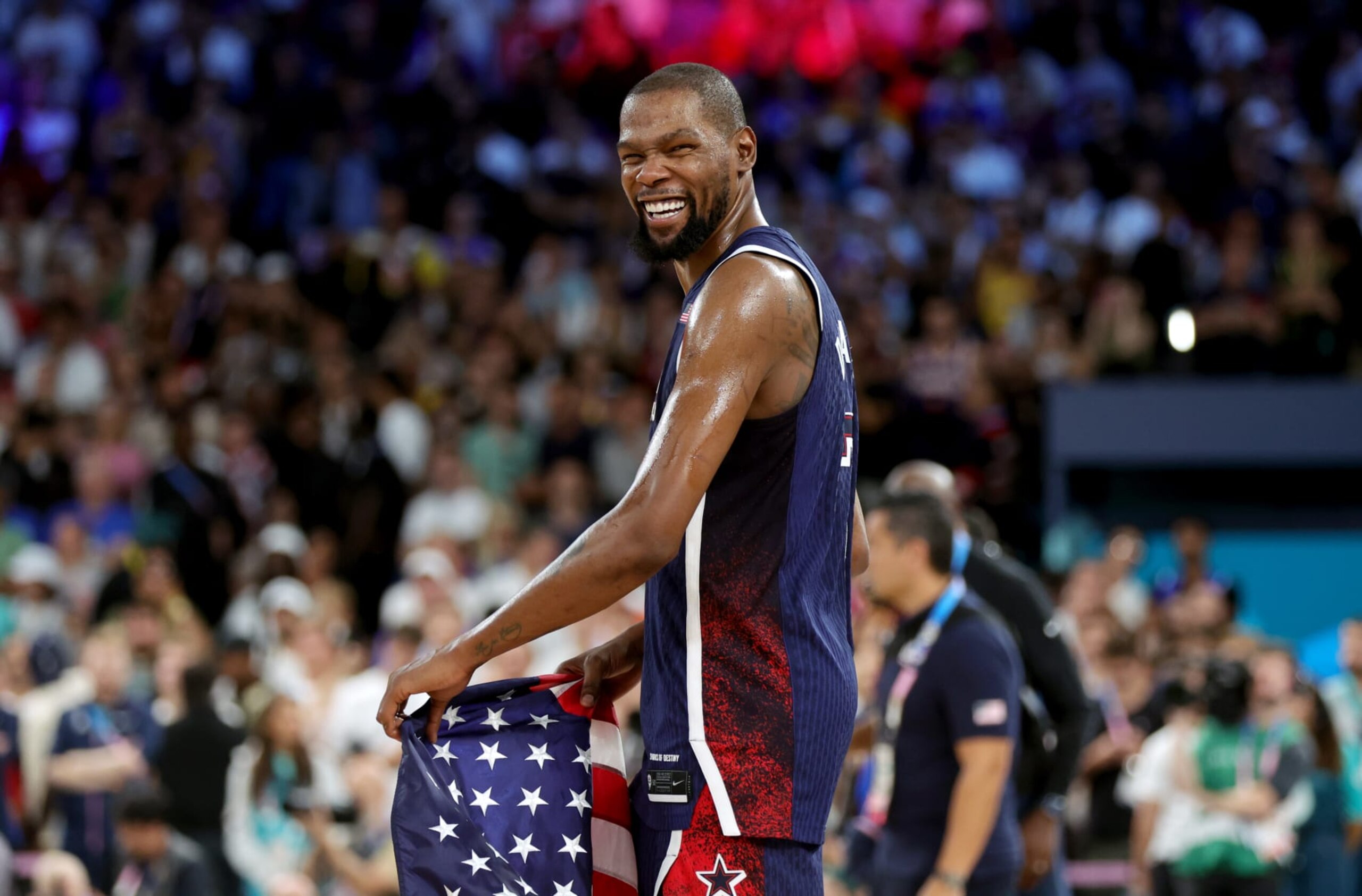 PARIS, FRANCE - AUGUST 10: Kevin Durant of United States celebrates after his team's victory during the Men's Gold Medal game between France and United States on day fifteen of the Olympic Games Paris 2024 at Bercy Arena on August 10, 2024 in Paris, France. (Photo by Christina Pahnke - sampics/Getty Images) PARIS, FRANCE - AUGUST 10: Kevin Durant of United States celebrates after his team's victory during the Men's Gold Medal game between France and United States on day fifteen of the Olympic Games Paris 2024 at Bercy Arena on August 10, 2024 in Paris, France. (Photo by Christina Pahnke - sampics/Getty Images)