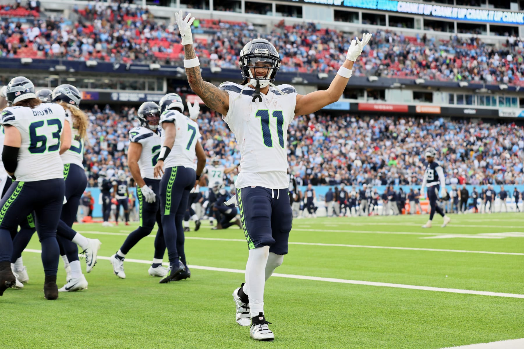 NASHVILLE, TENNESSEE - DECEMBER 24: Jaxon Smith-Njigba #11 of the Seattle Seahawks reacts after a play during the second half in the game against the Tennessee Titans at Nissan Stadium on December 24, 2023 in Nashville, Tennessee. (Photo by Andy Lyons/Getty Images)