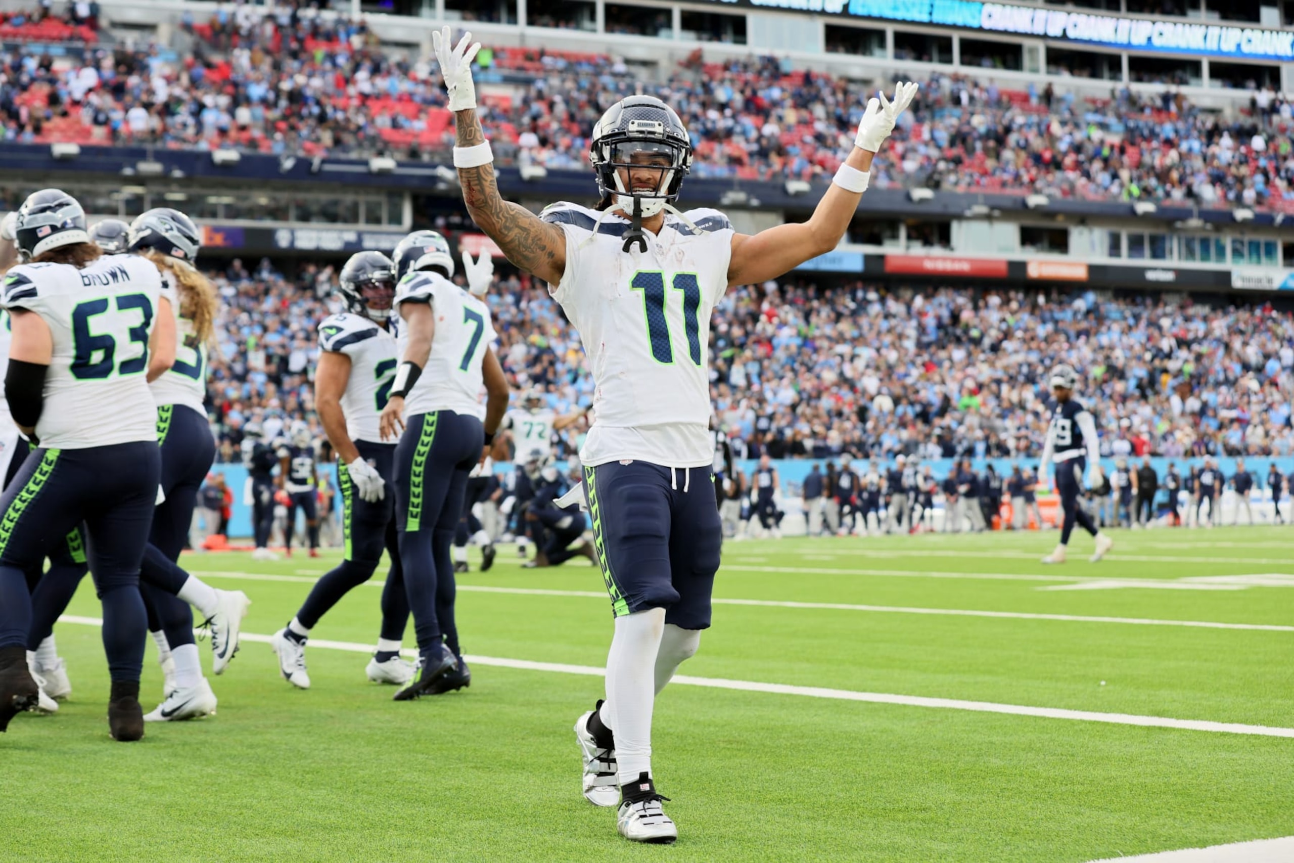 NASHVILLE, TENNESSEE - DECEMBER 24: Jaxon Smith-Njigba #11 of the Seattle Seahawks reacts after a play during the second half in the game against the Tennessee Titans at Nissan Stadium on December 24, 2023 in Nashville, Tennessee. (Photo by Andy Lyons/Getty Images) NASHVILLE, TENNESSEE - DECEMBER 24: Jaxon Smith-Njigba #11 of the Seattle Seahawks reacts after a play during the second half in the game against the Tennessee Titans at Nissan Stadium on December 24, 2023 in Nashville, Tennessee. (Photo by Andy Lyons/Getty Images)